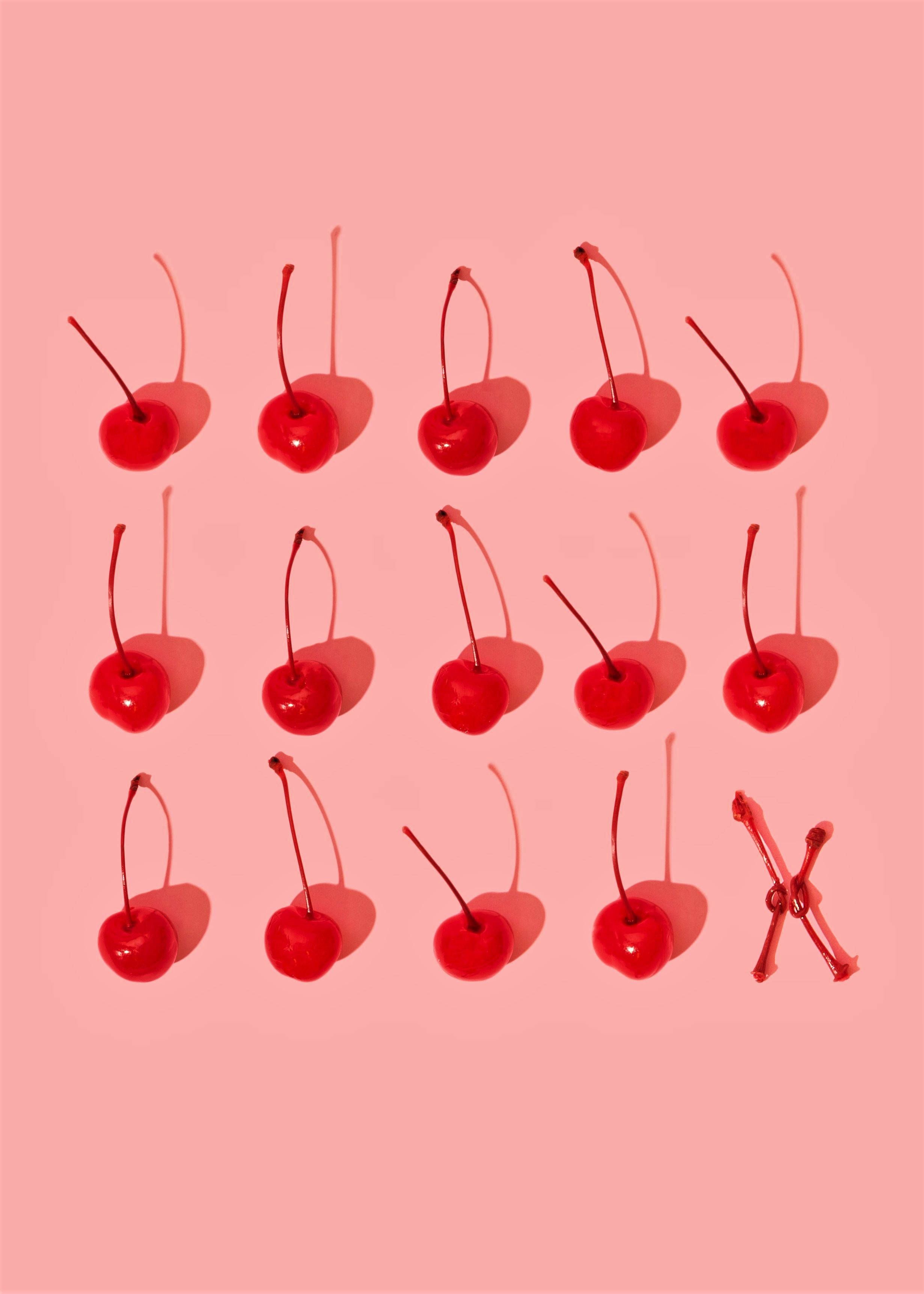 A pattern of cherries on a pink background - Red, cherry
