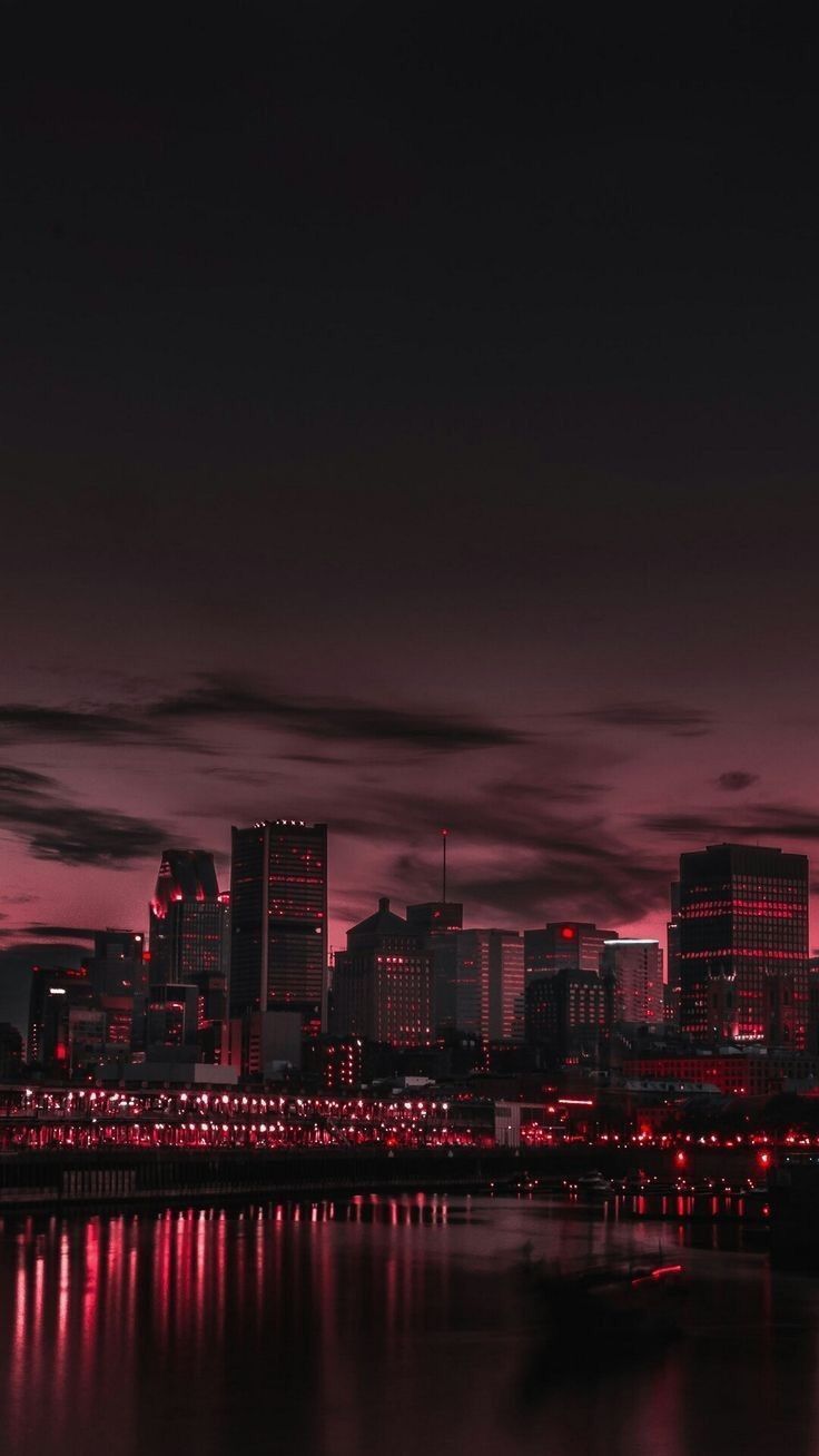 Aesthetic wallpaper for phone of a city lit up at night - Dark red