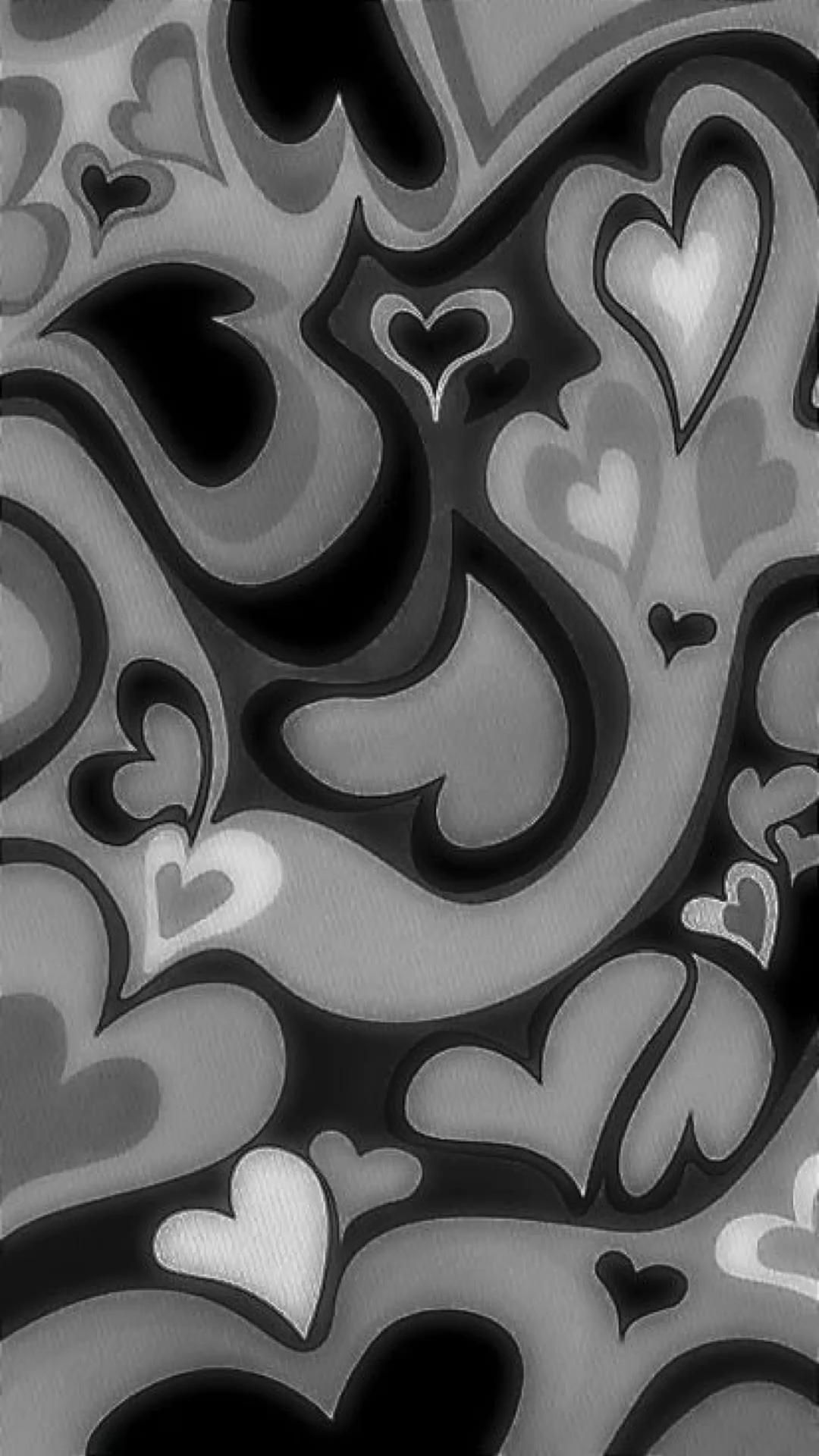 A black and white pattern of hearts and swirls - Black heart