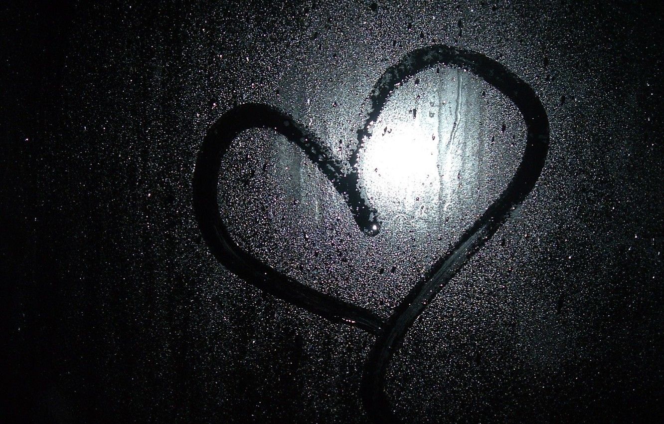 A heart drawn on a window covered in water. - Black heart