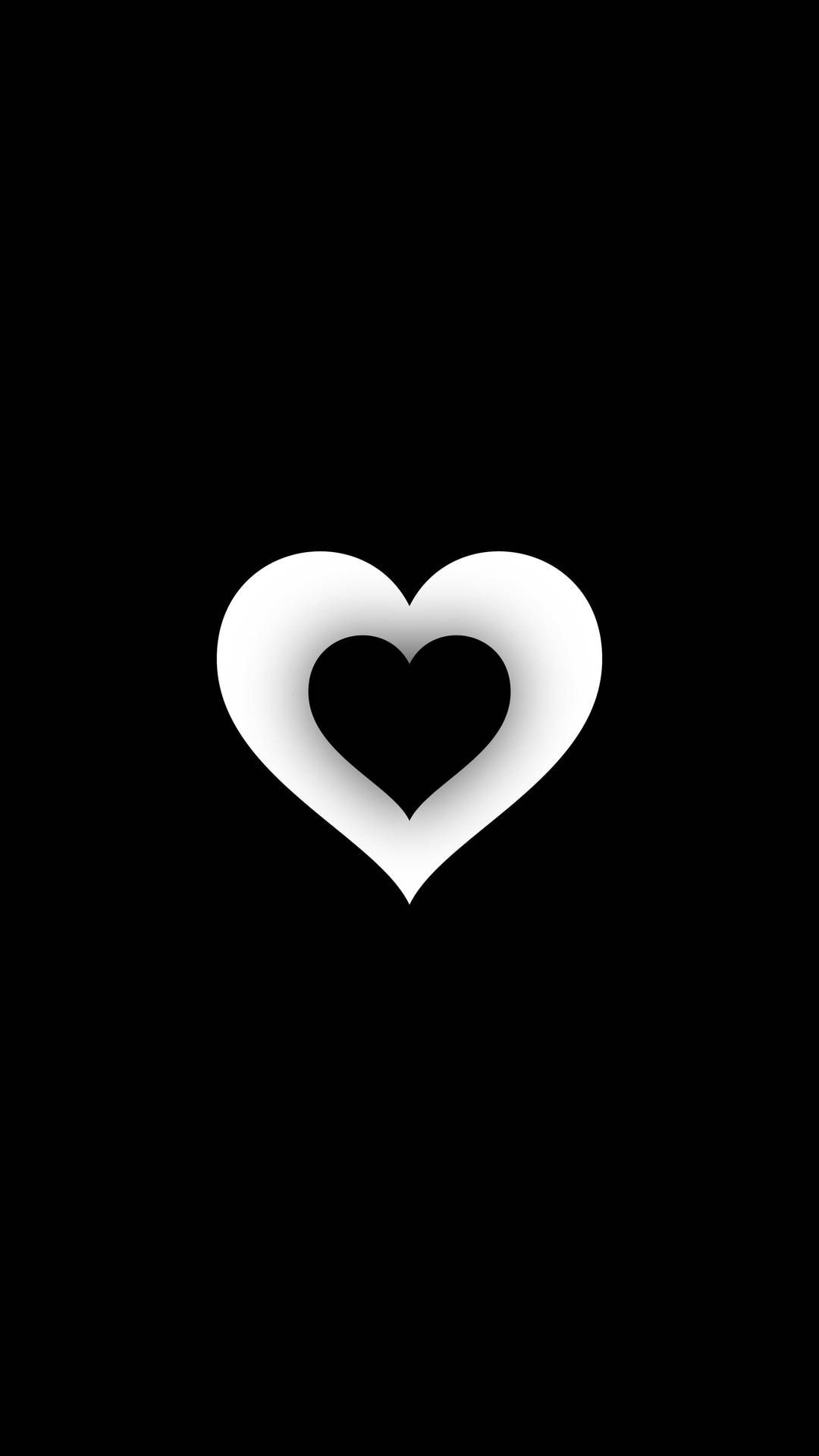 A black and white heart on the wall - Black heart