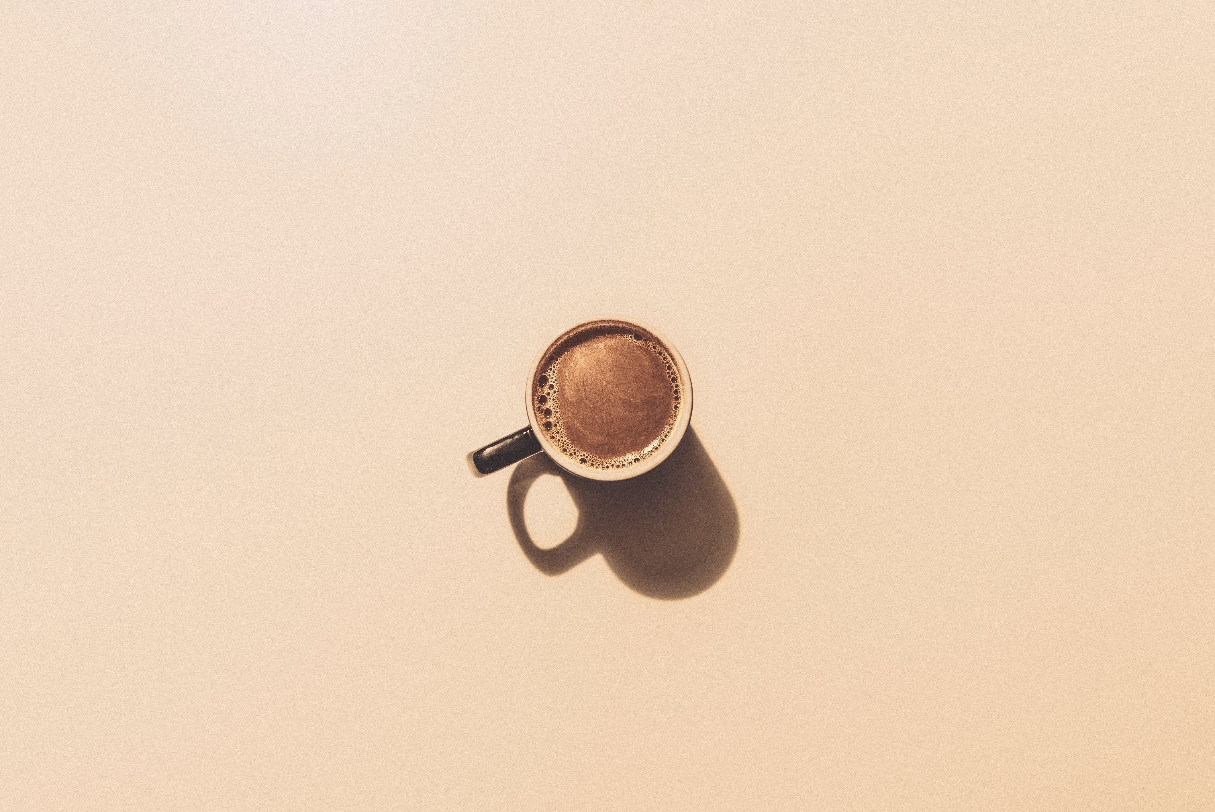 A cup of coffee on a white background - Coffee