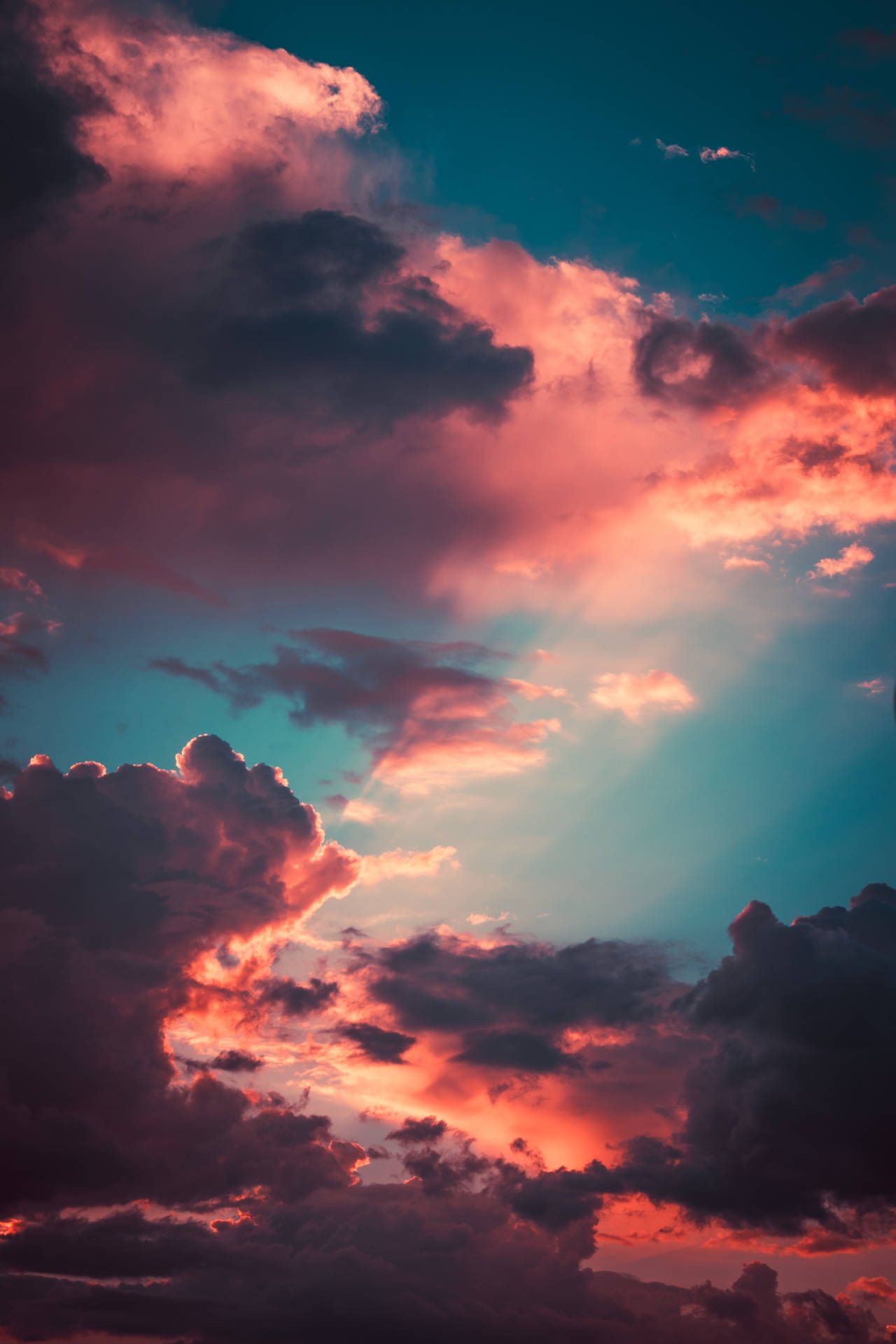 A photo of a blue and pink sky with clouds - Vintage clouds