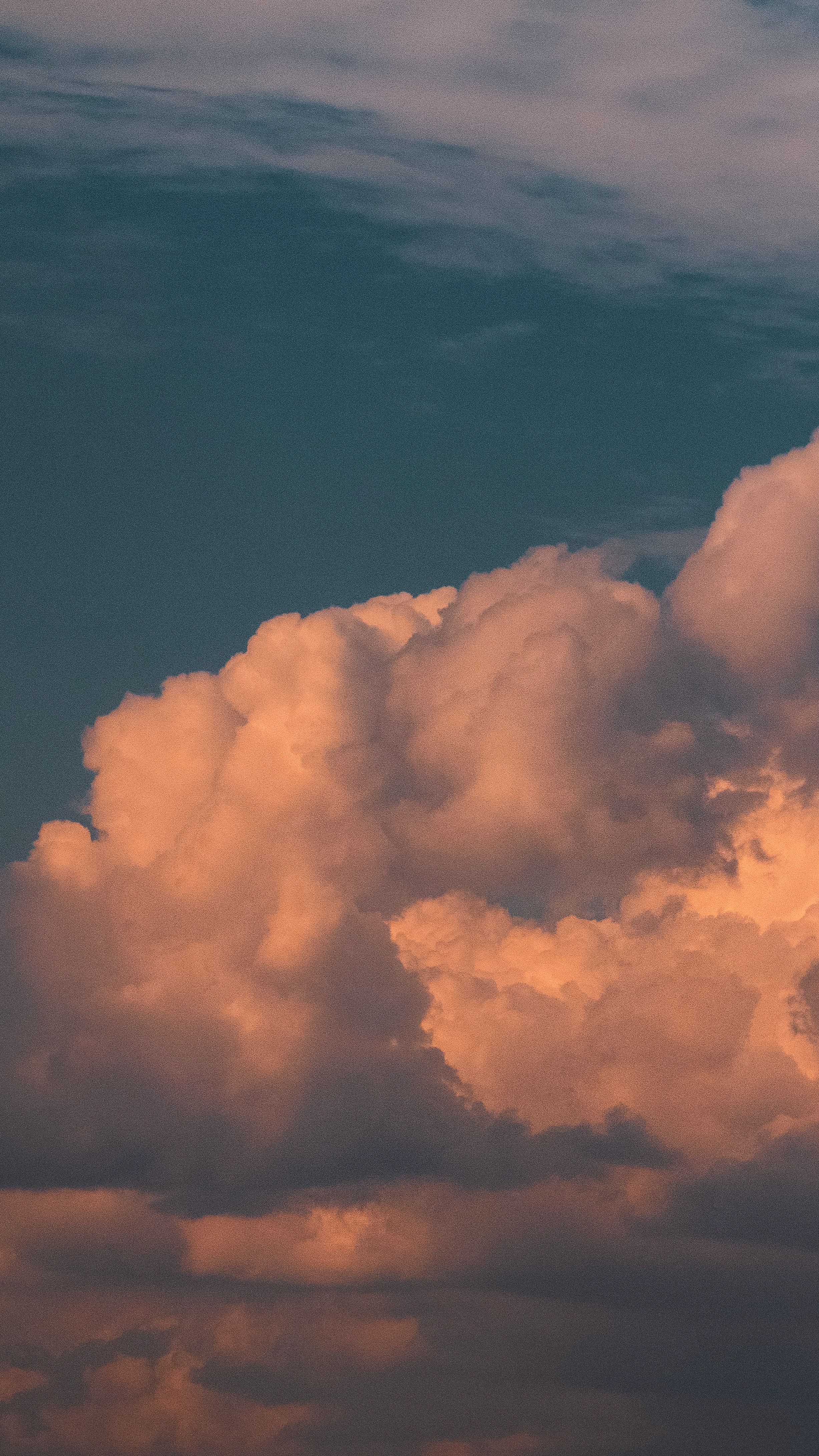 A beautiful photo of a cloud formation in the sky during sunset. - Vintage clouds