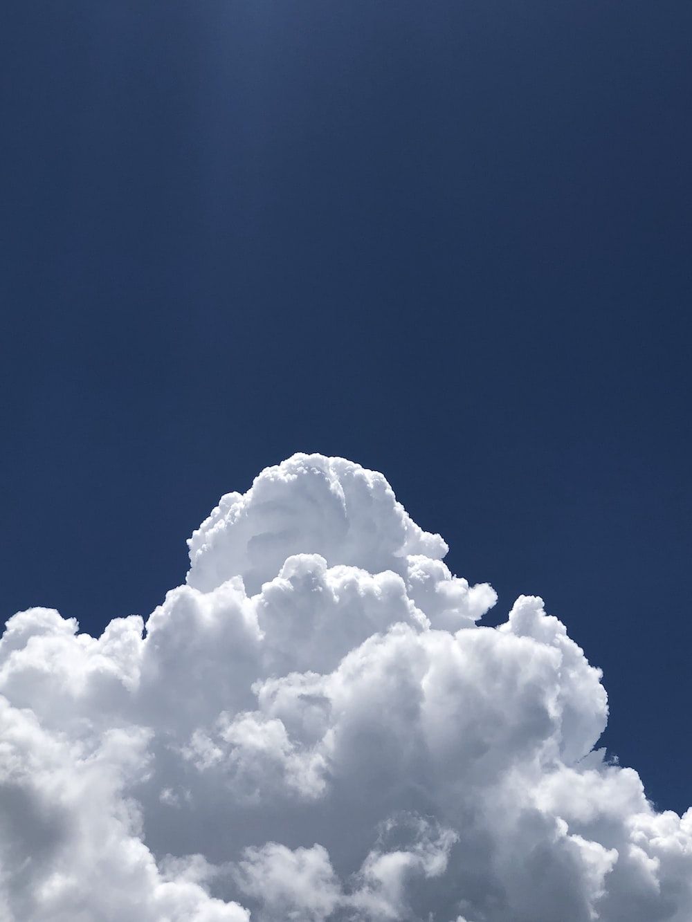 white clouds and blue sky during daytime photo