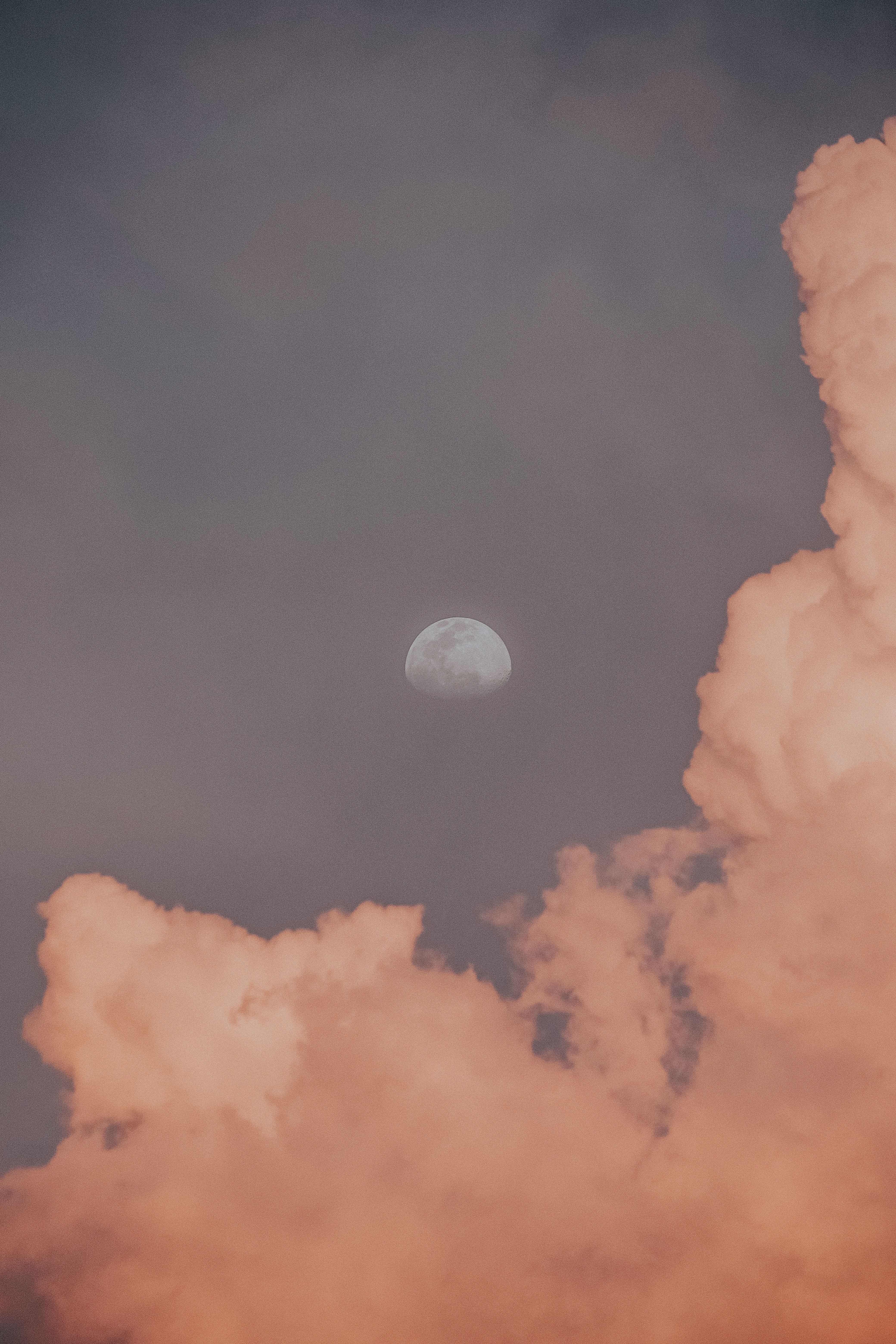 A plane flying over the moon in front of clouds - Vintage clouds