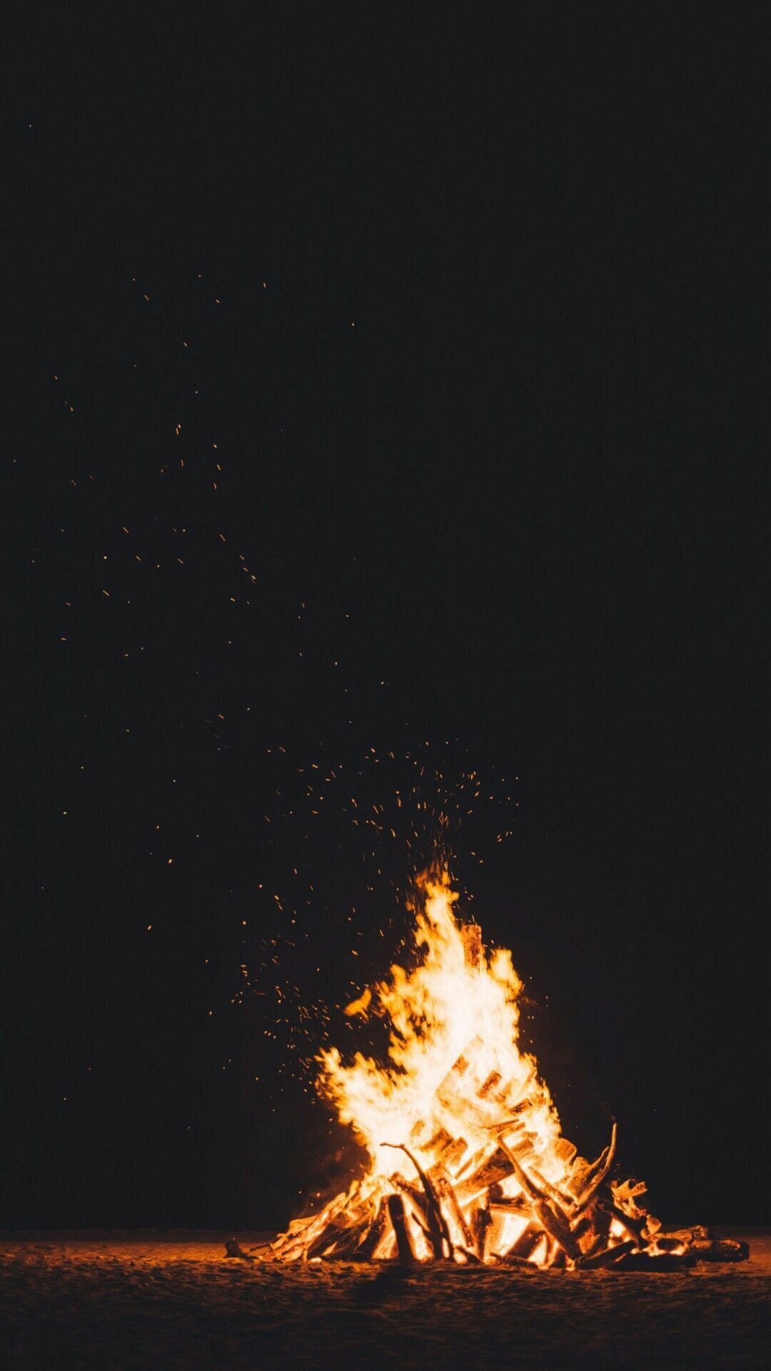 A bonfire burning in the dark - Fire