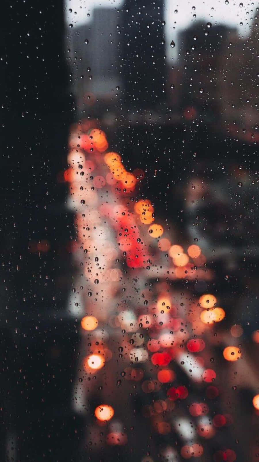 A view of traffic from the window on rainy night - Rain, blurry