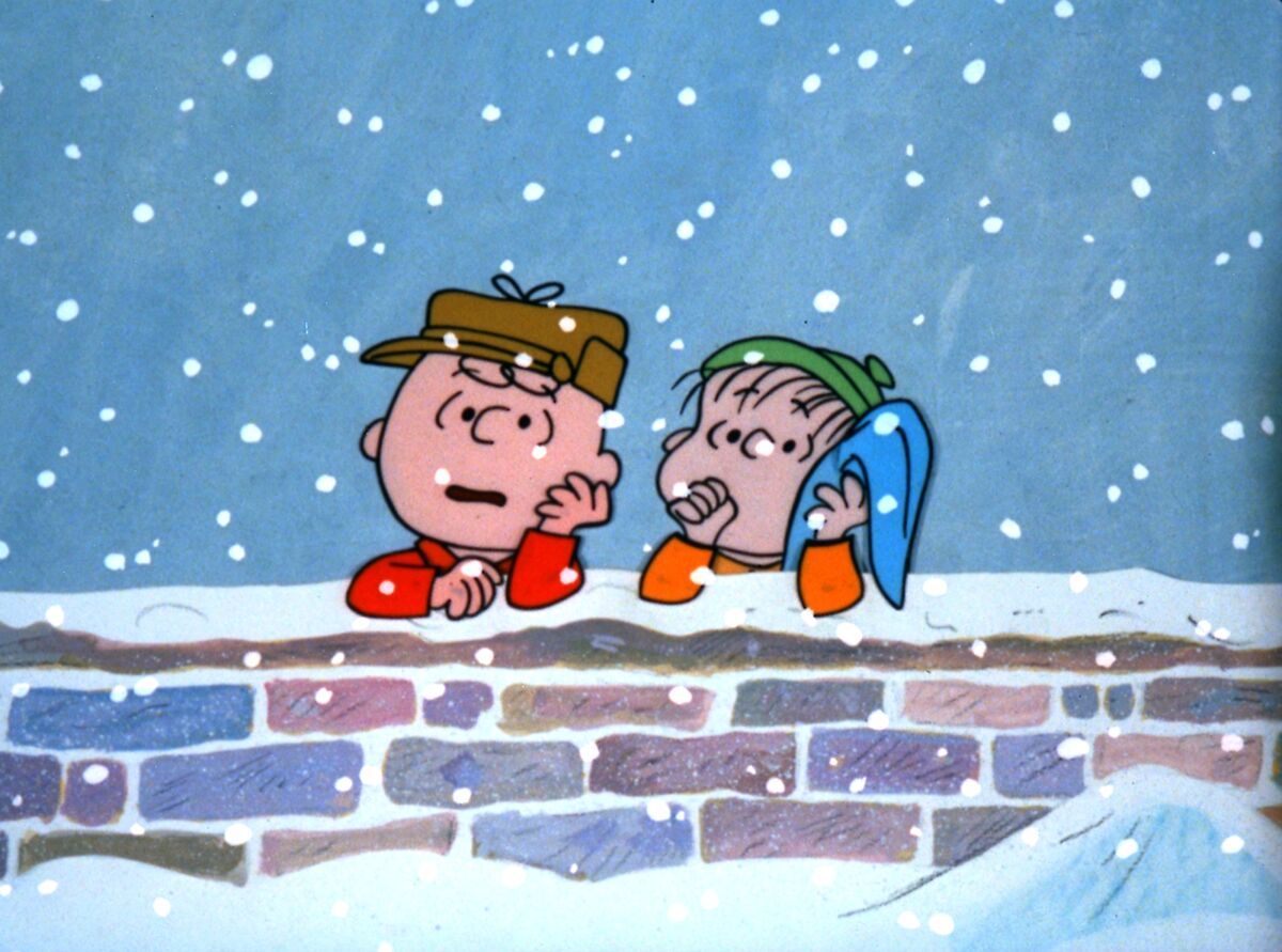 A cartoon of two characters looking at the snow - Charlie Brown