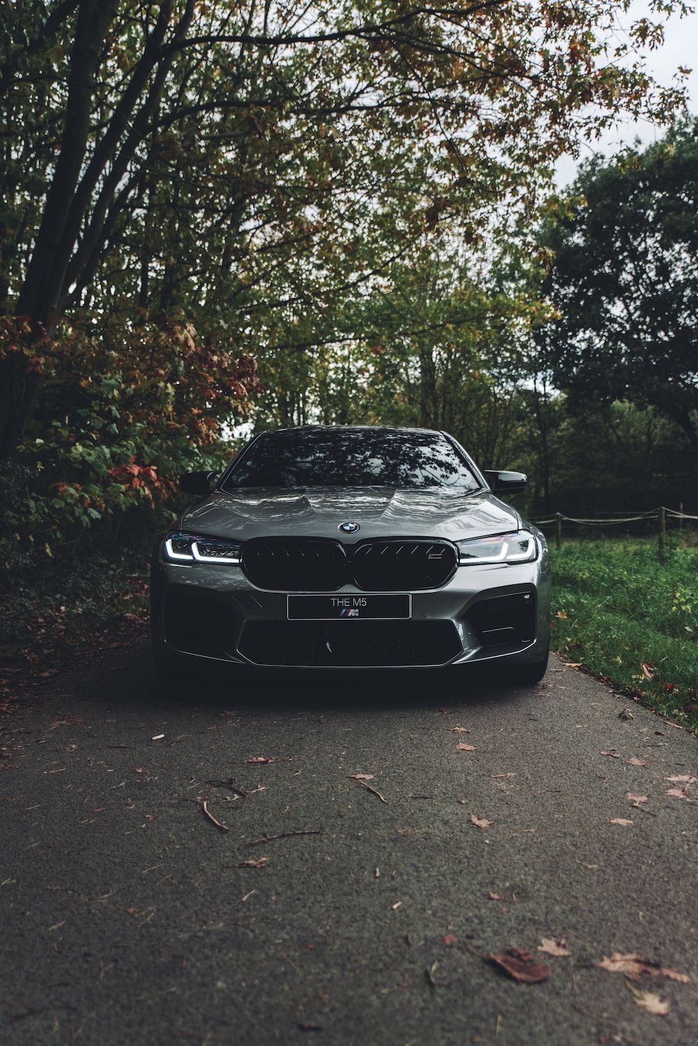 A car is parked on the side of road - BMW