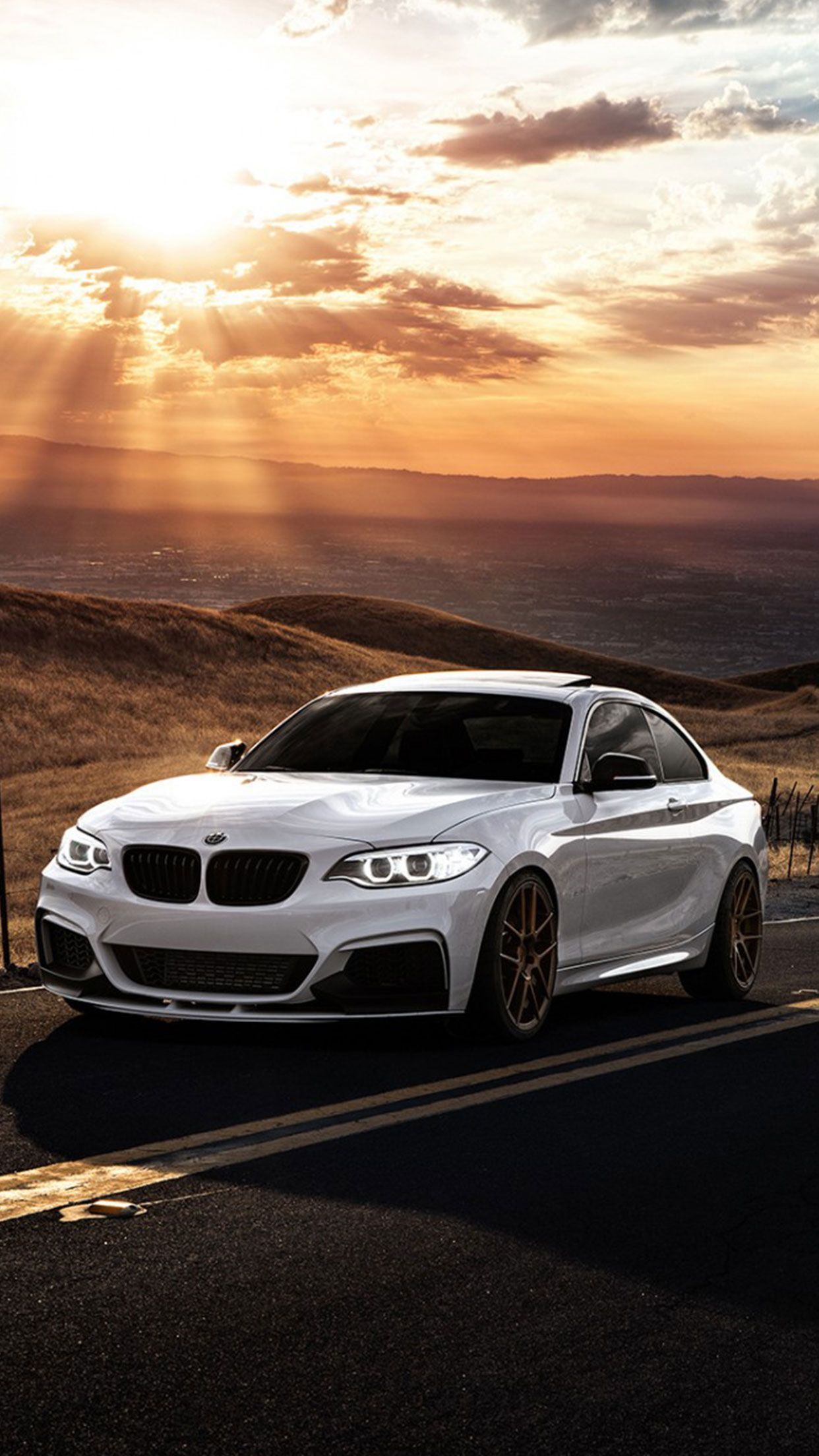 BMW 2 series in the sunset - BMW
