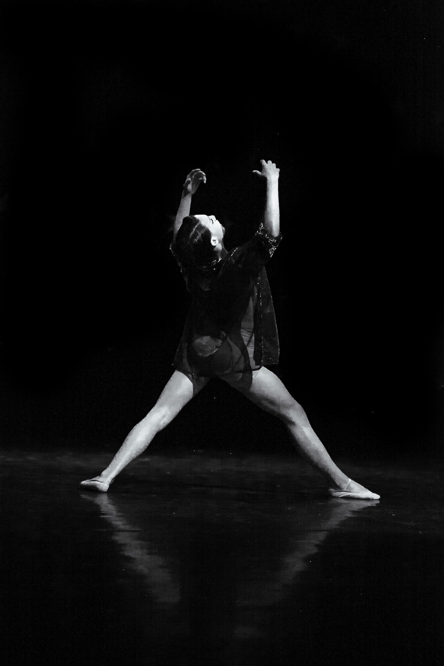 A Grayscale of a Woman Practicing Ballet · Free