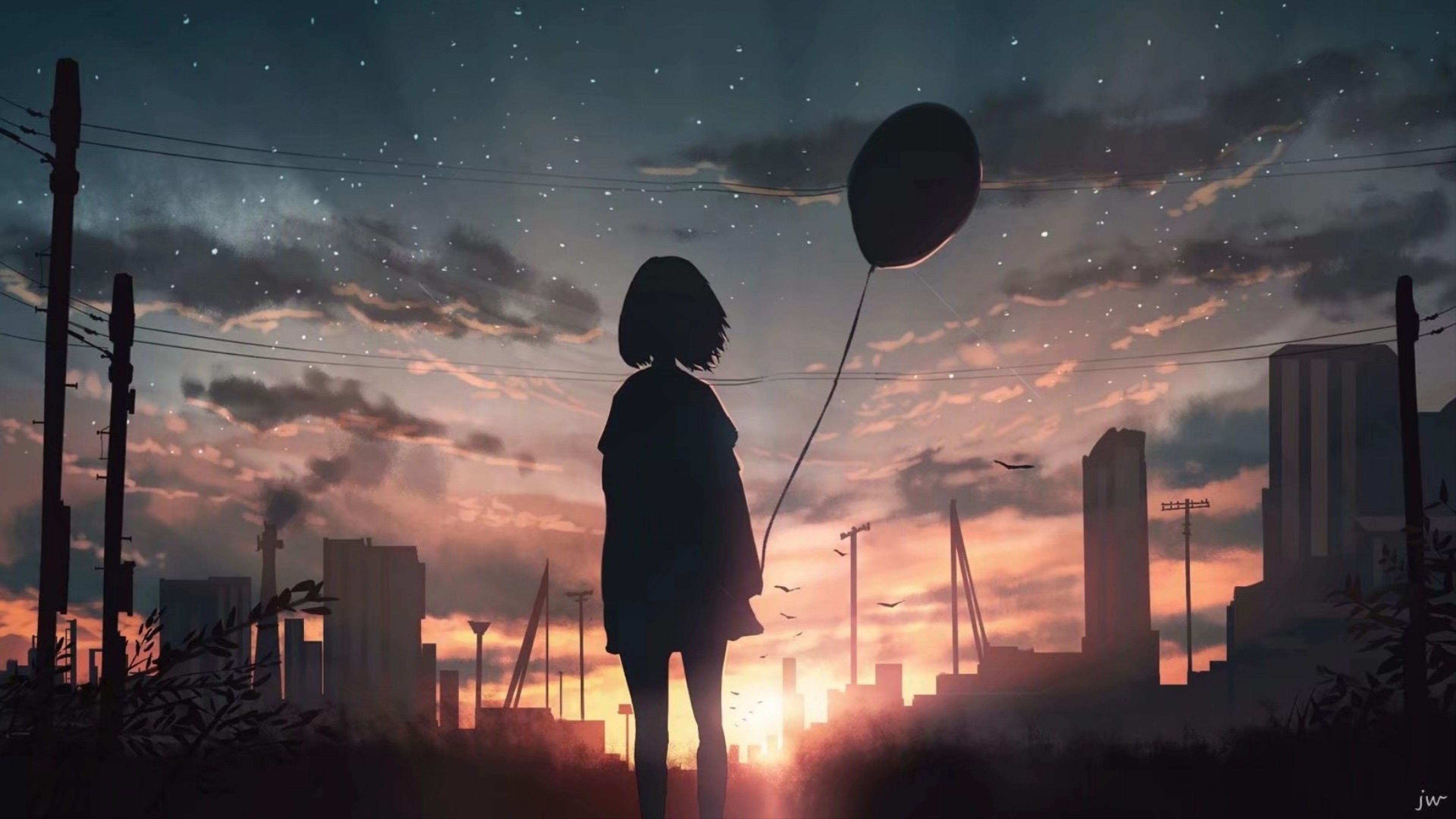 A girl holding balloons in the city - Sunset