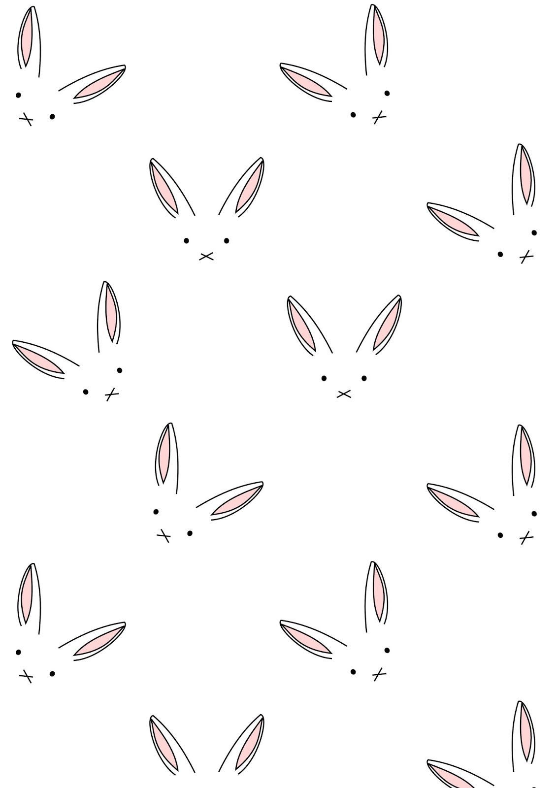 A white background with black and pink bunny ears - Easter