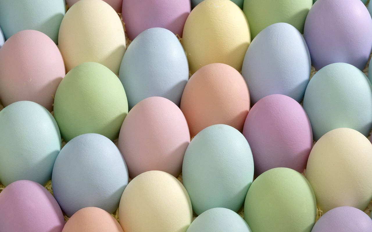 A large pile of pastel colored Easter eggs. - Easter