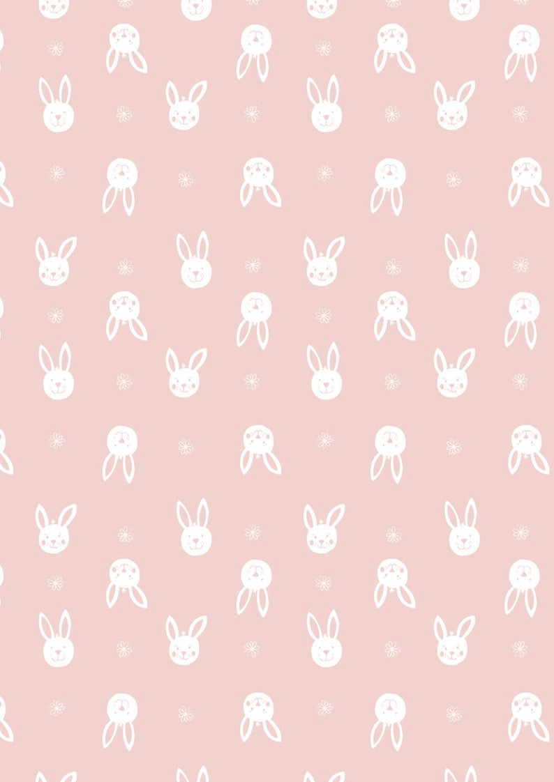 A pink and white pattern of rabbits and flowers - Easter