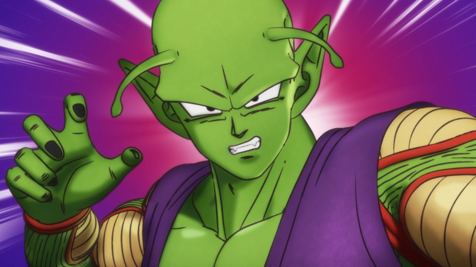 Piccolo, a green-skinned man with a bald head and two long green pointy ears, raises his left hand in the air, his index and pinky fingers curled inwards. He's wearing a purple toga over a green tunic and has a series of green bands around his arm. - Dragon Ball