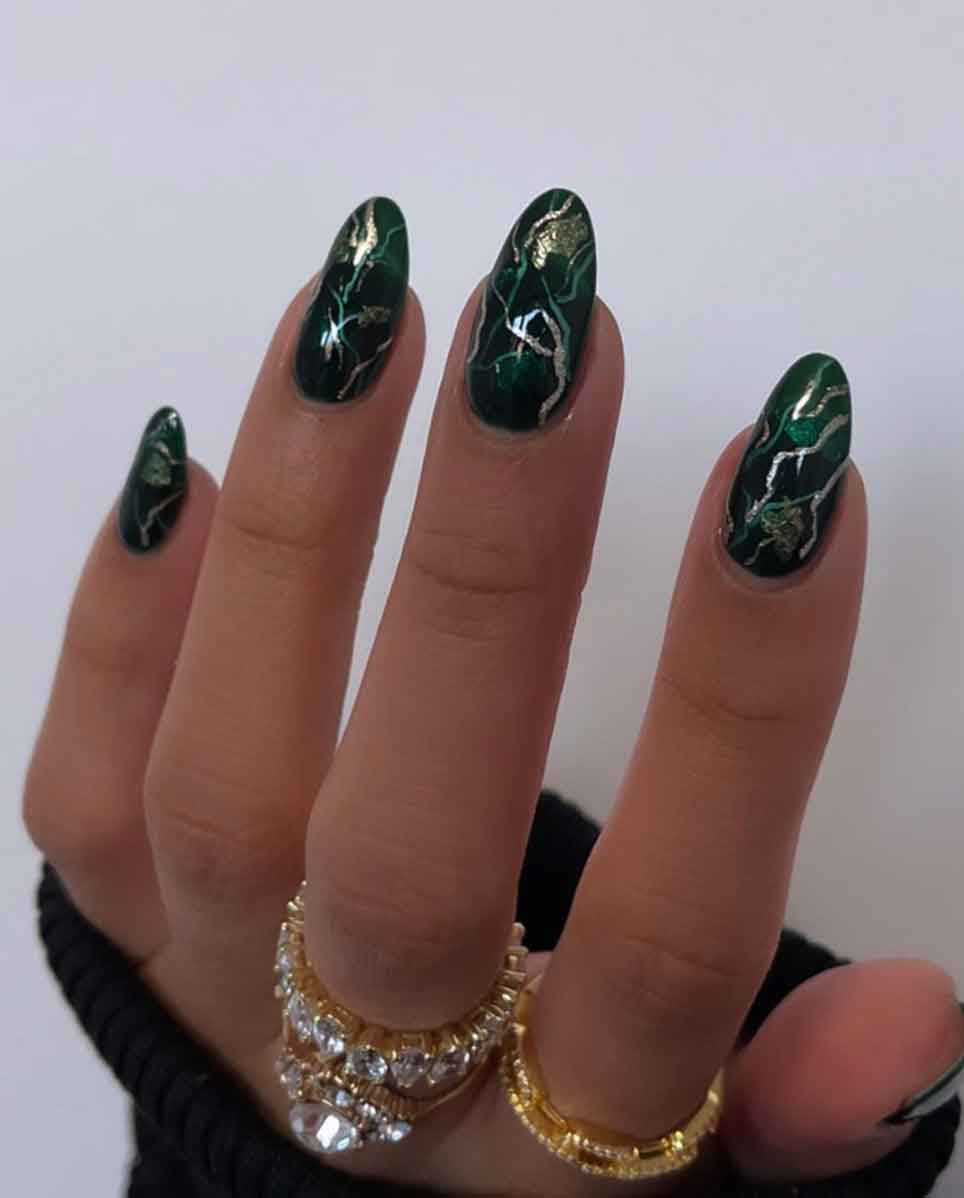 Green and gold nail art on a short square nail shape - Nails