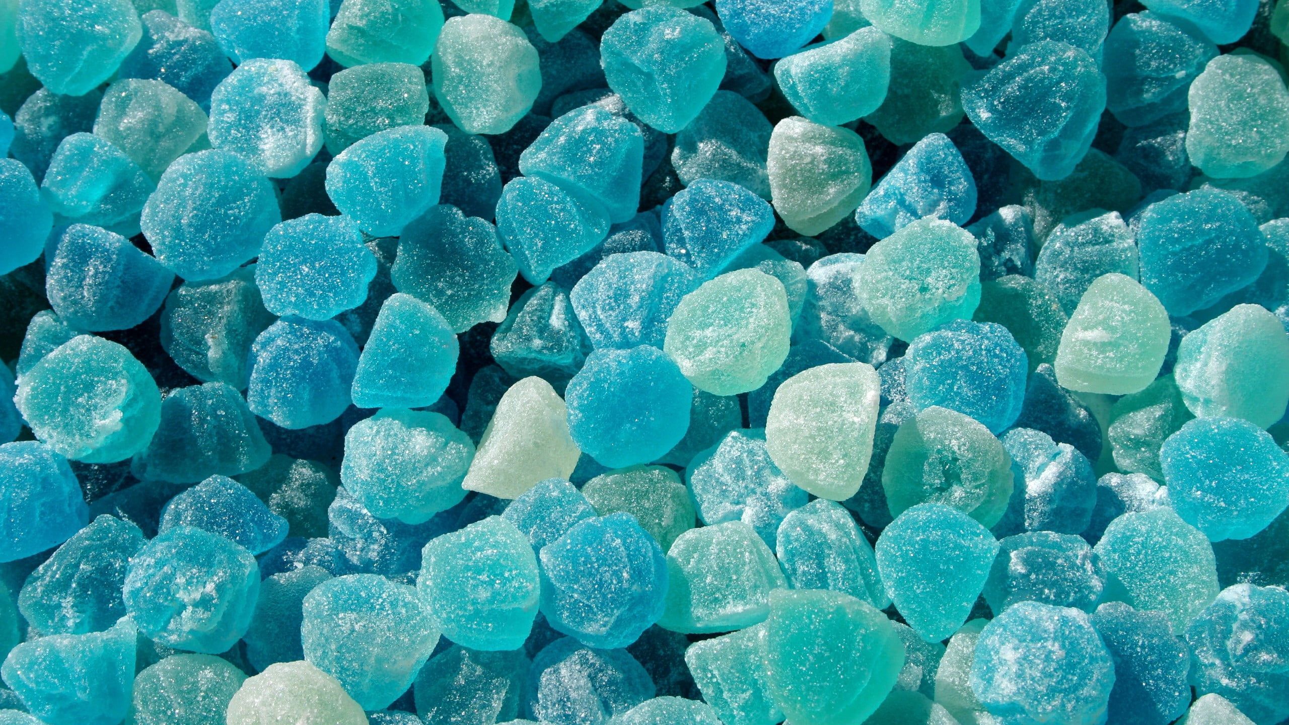 A pile of blue and green hard candies - Cyan, candy