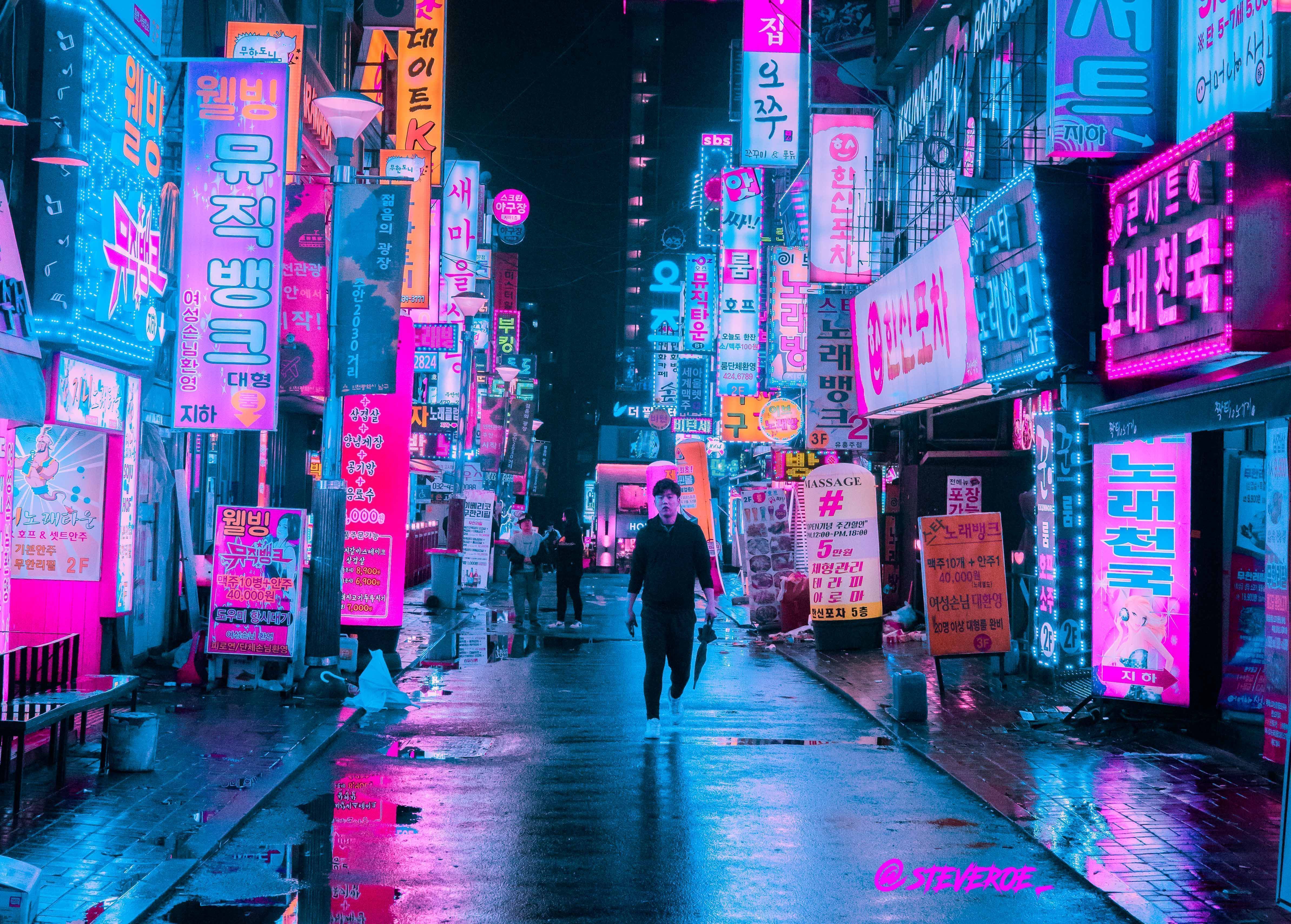 A man walking down a neon lit street in the city - Cyberpunk, Seoul