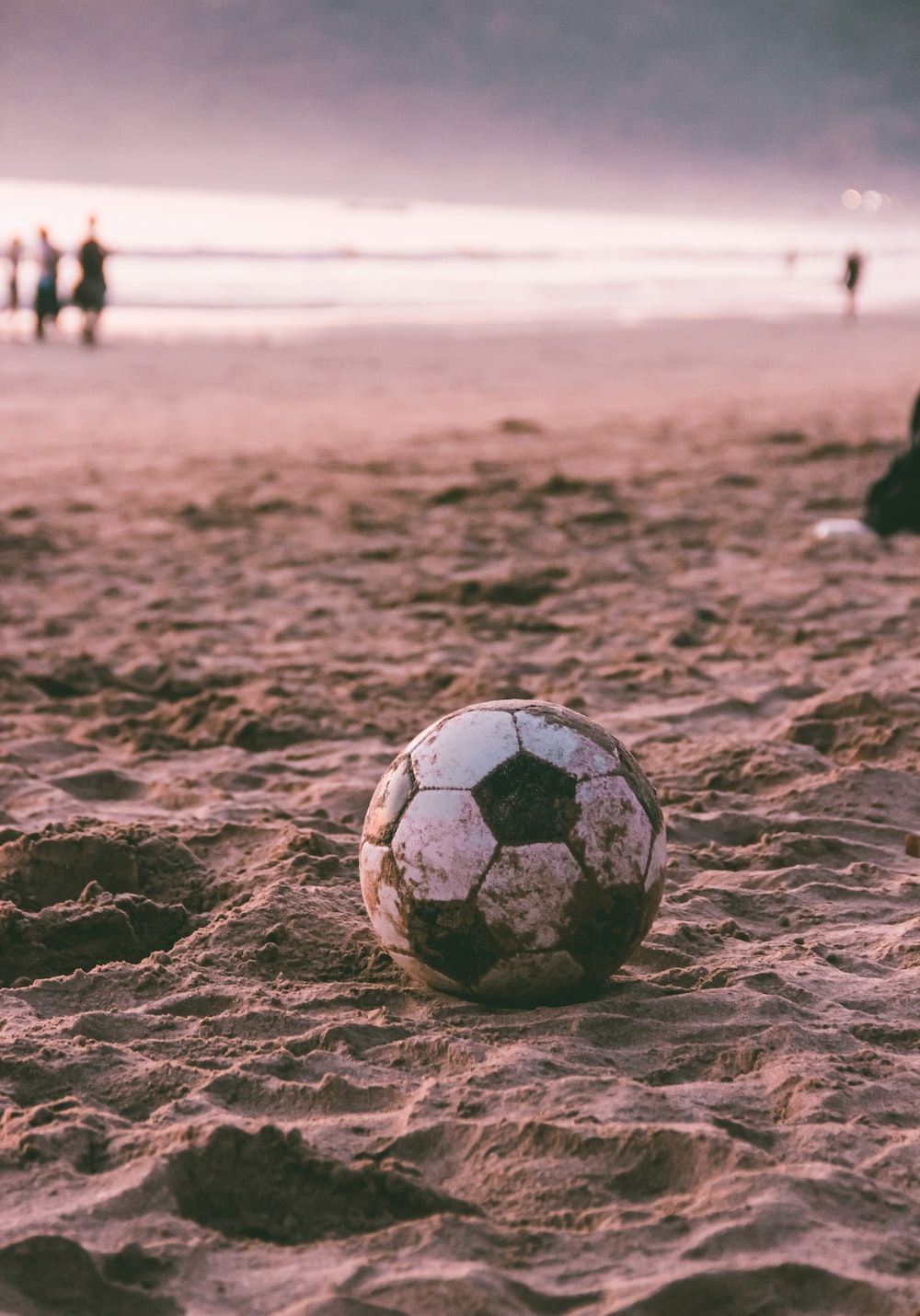 A soccer ball on the beach - Soccer