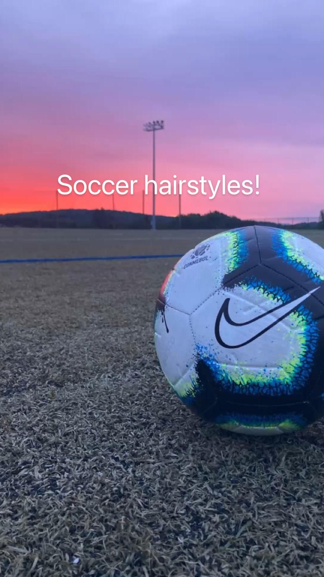 A soccer ball on the ground with text that reads, 'sports hairstyles' - Soccer