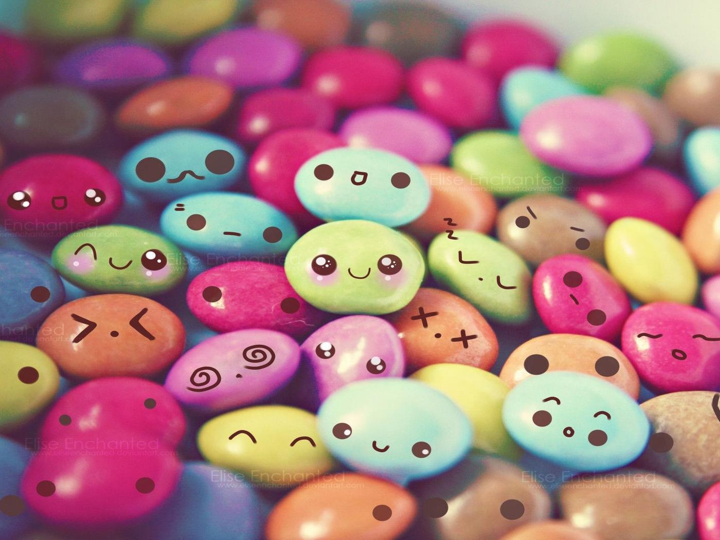 Colored chocolate candies and funny faces