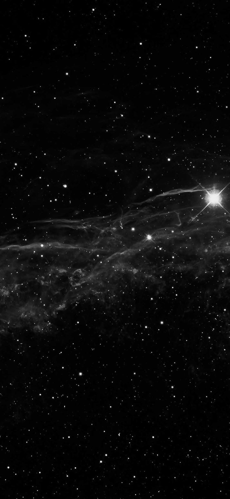 A black and white image of the milky way - Stars