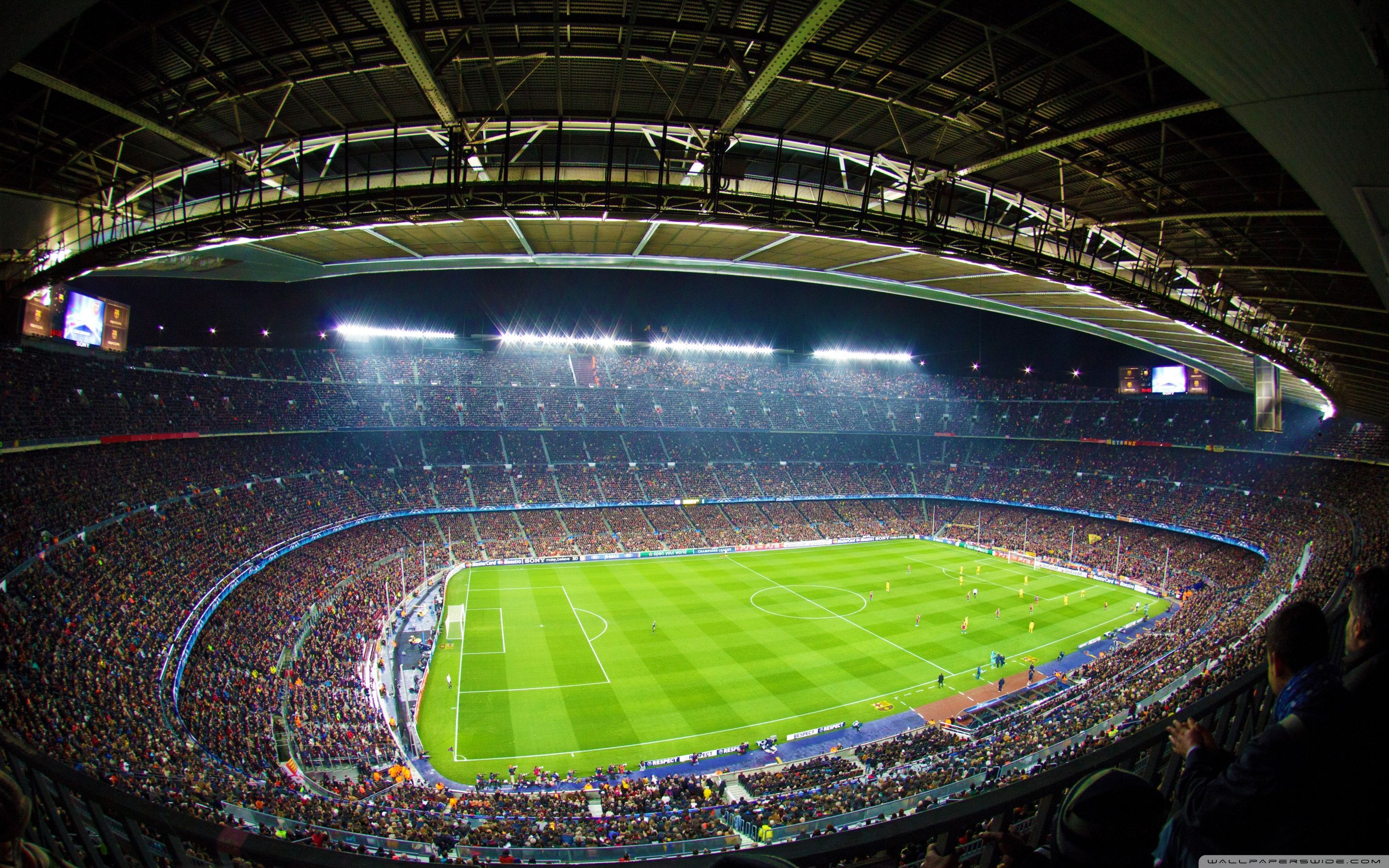 A large stadium with many people in it - Soccer
