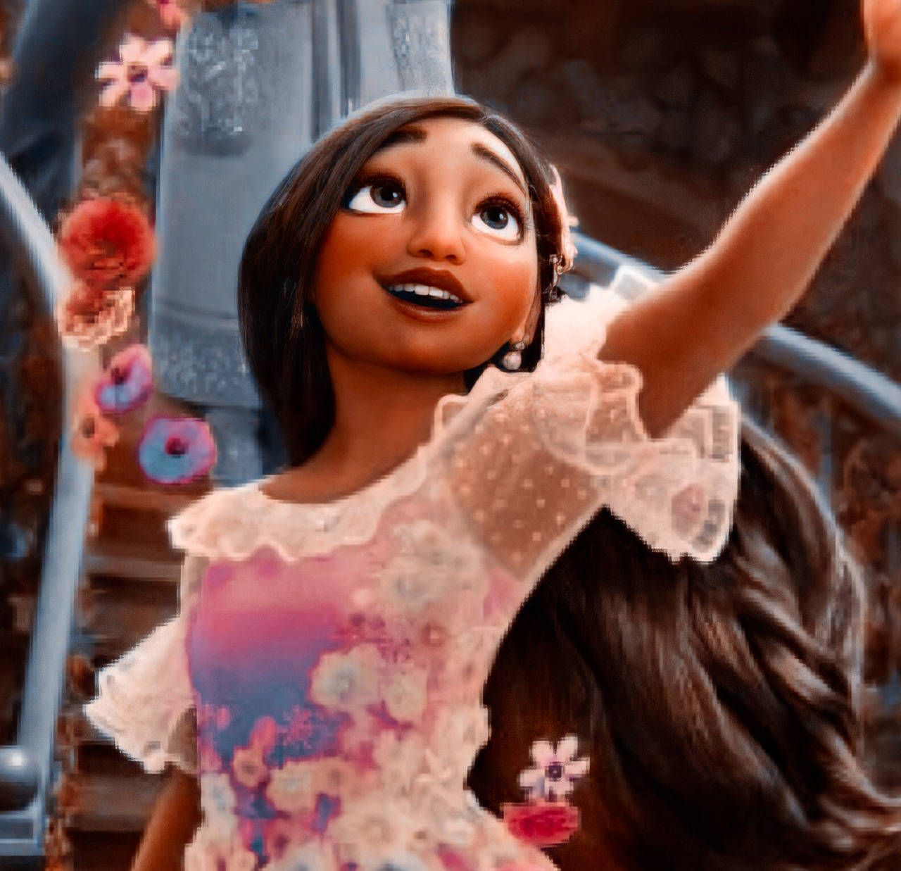 A young girl in an animated movie is holding up her hand - Encanto