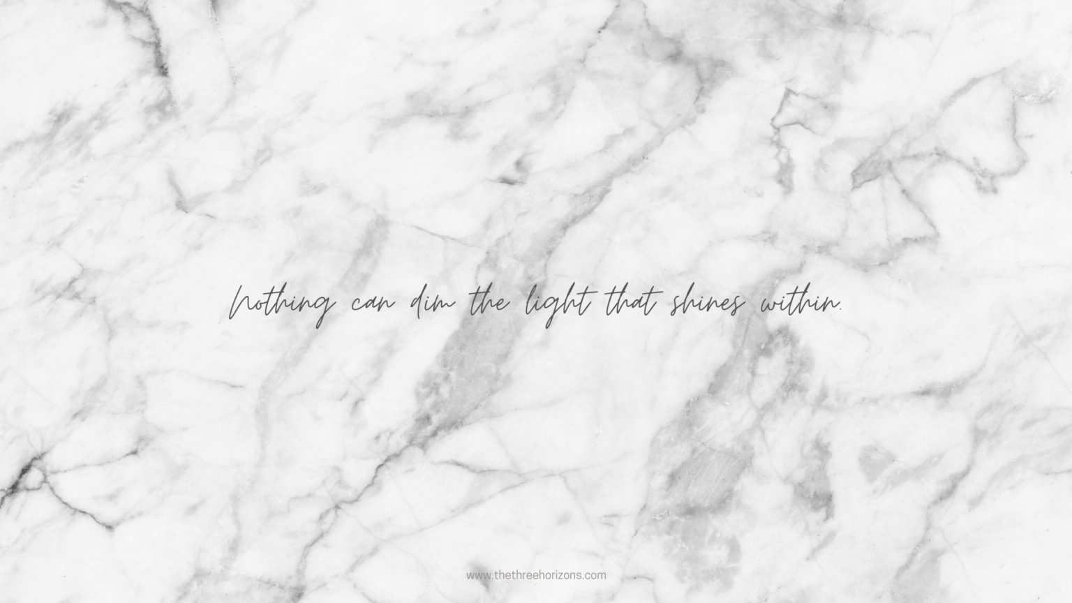 A quote on white marble with black text - Marble
