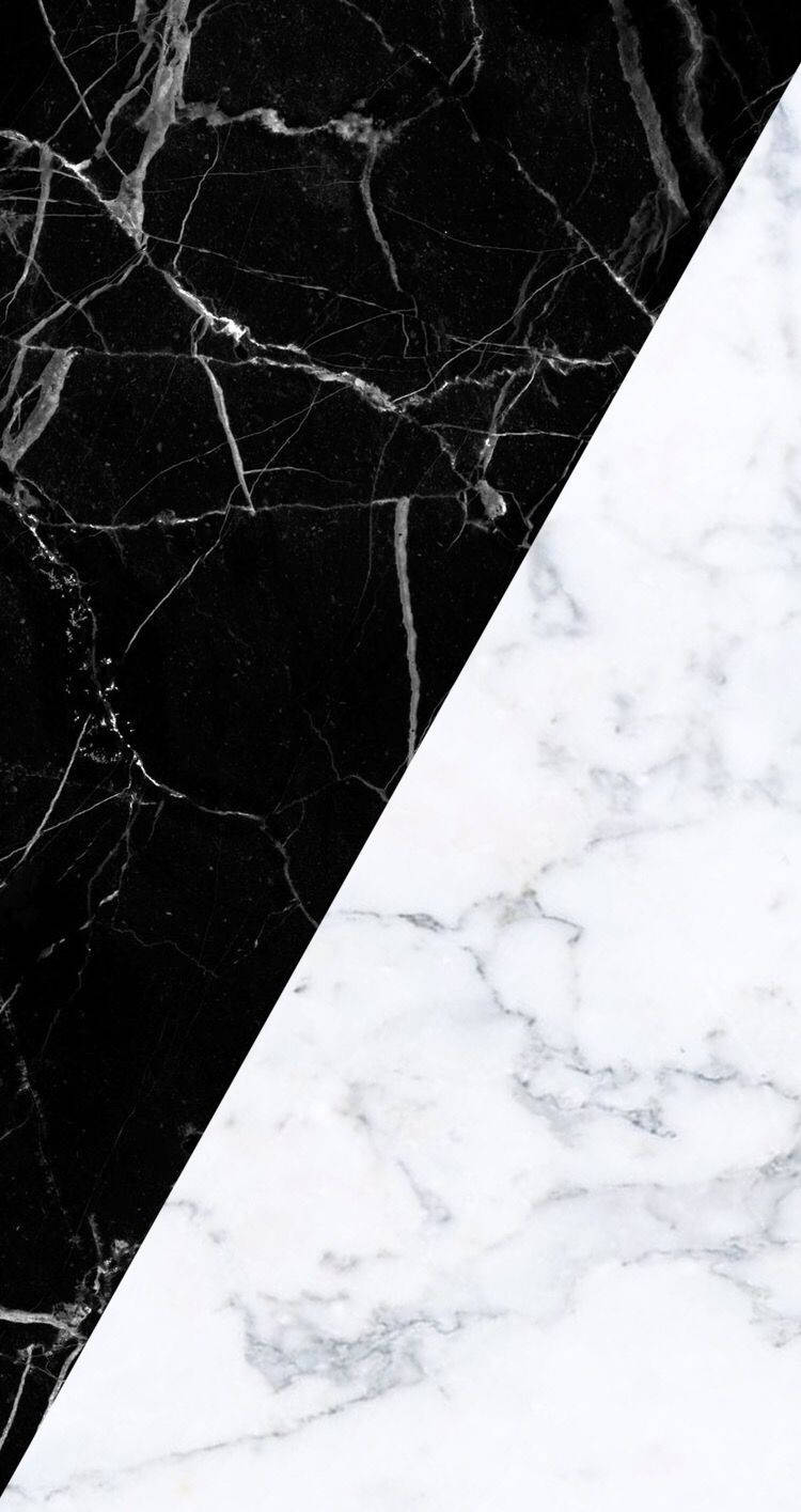 A black and white marble pattern on the floor - Marble