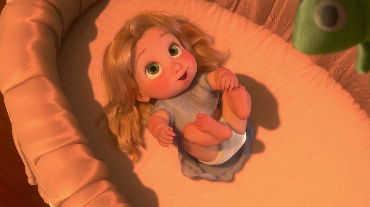 A baby doll is laying in her crib - Rapunzel