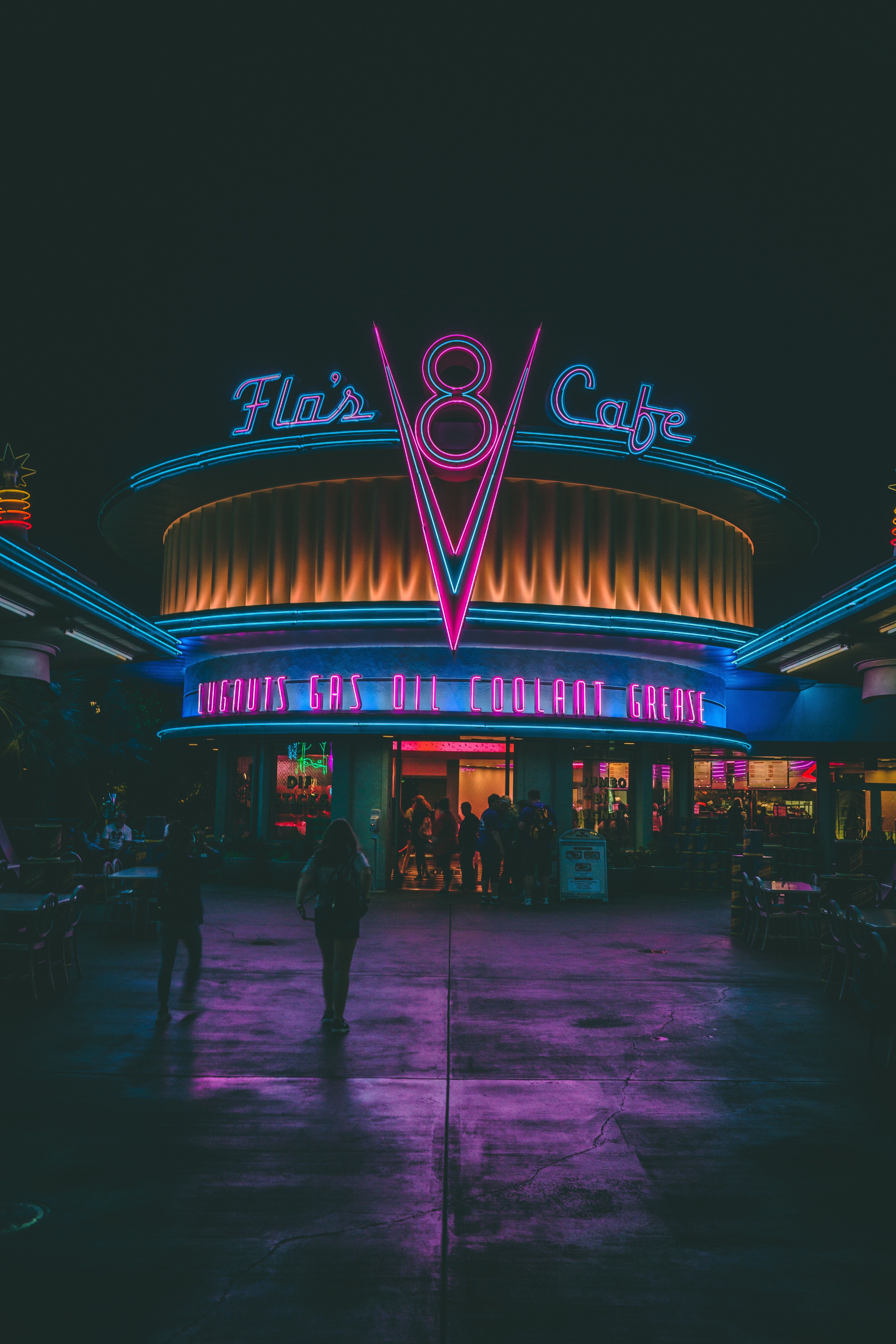 A purple and blue neon sign that says Flo's V8 Cafe. - Neon, HD