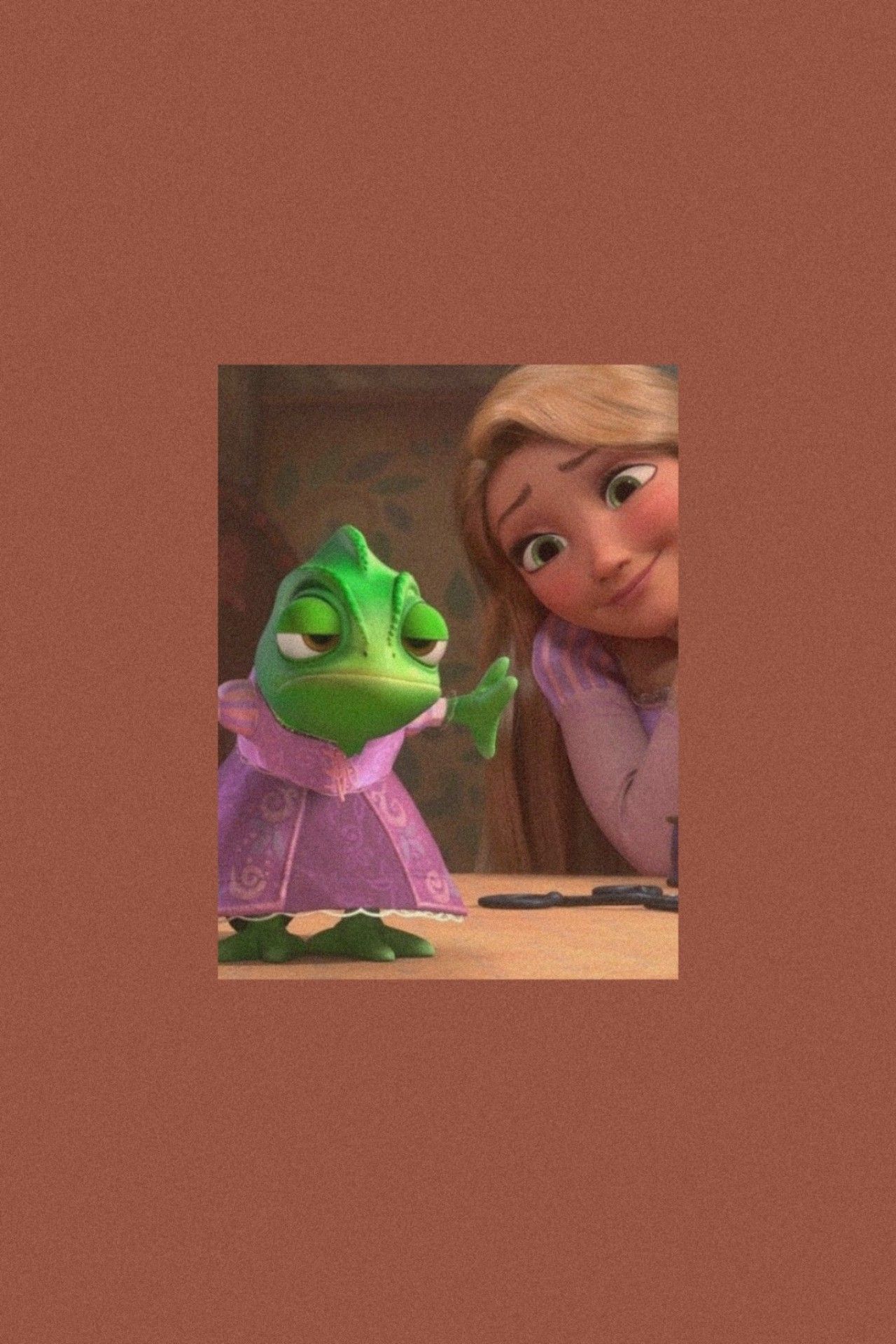 A cartoon image of a girl and a frog - Rapunzel