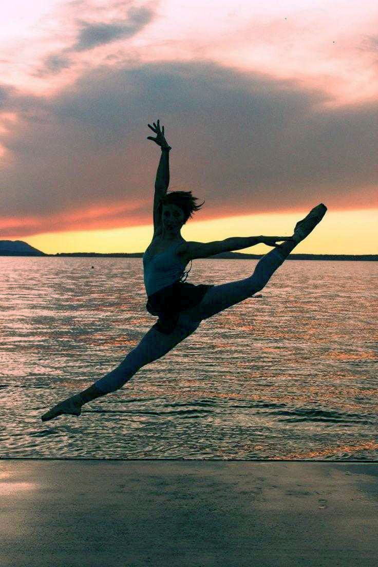 A woman is doing ballet on the beach - Gymnastics