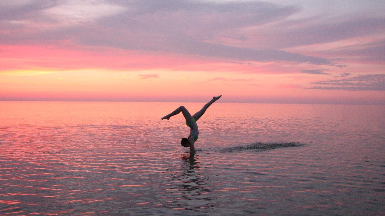 A person doing gymnastics in the water - Gymnastics