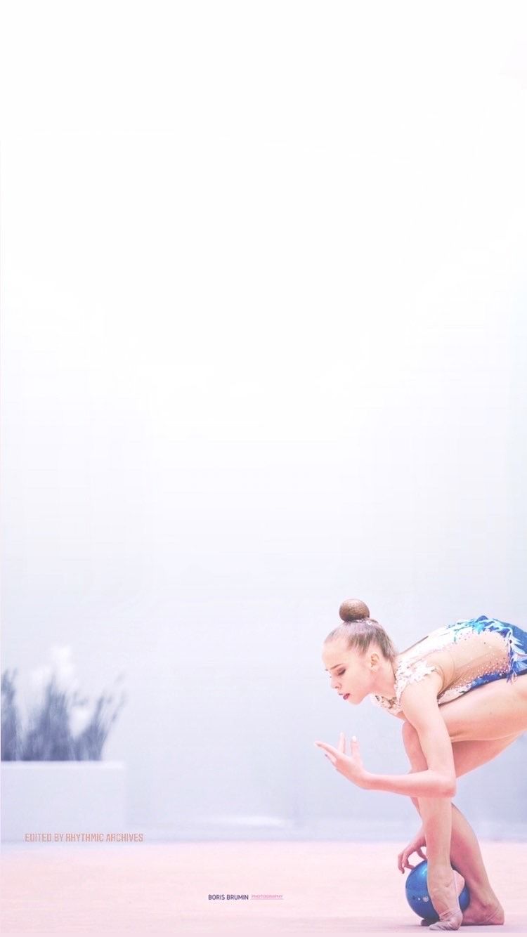 A young gymnast with a blue ball - Gymnastics