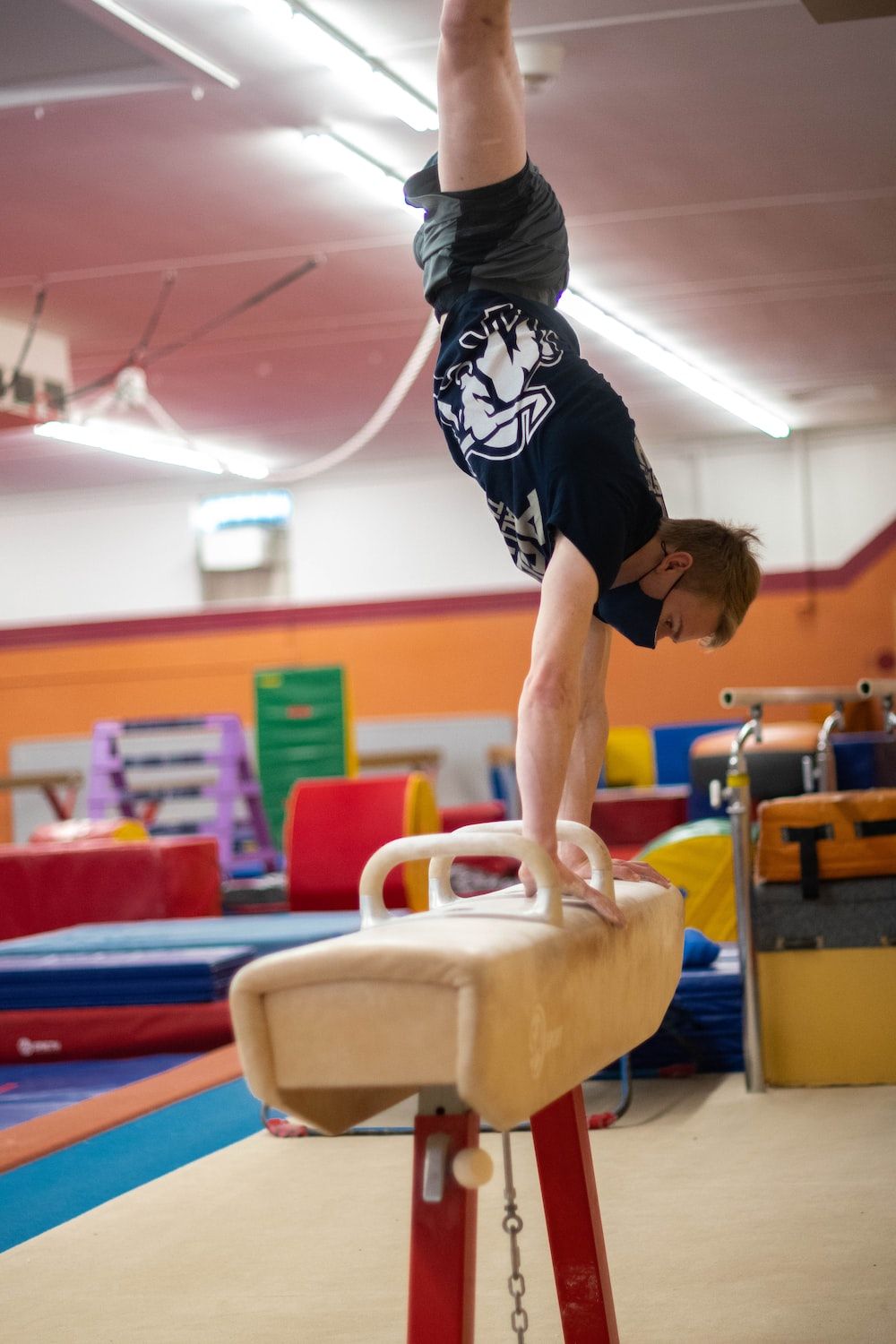 UConn men's gymnastics team member, junior John Czisny, practices on the pommel horse on Tuesday, March 2, 2021. - Gymnastics