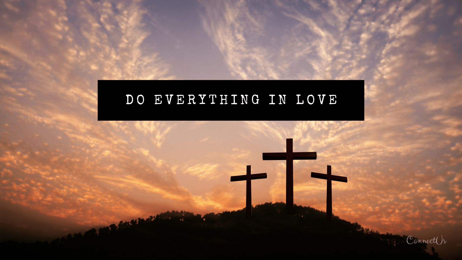 A sunset with three crosses and the words do everything in love - Cross