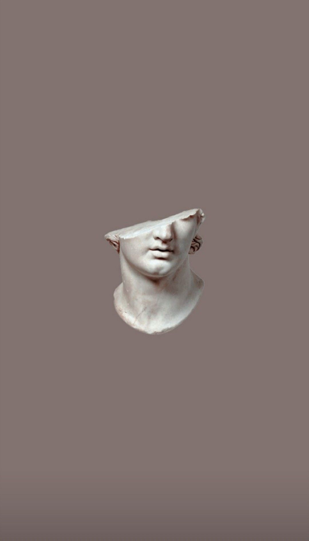A white sculpture of a face on a grey background - Greek statue, statue