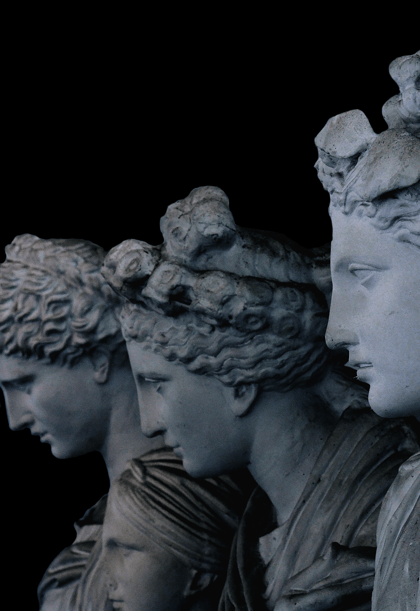 A sculpture of three women's heads. - Greek statue