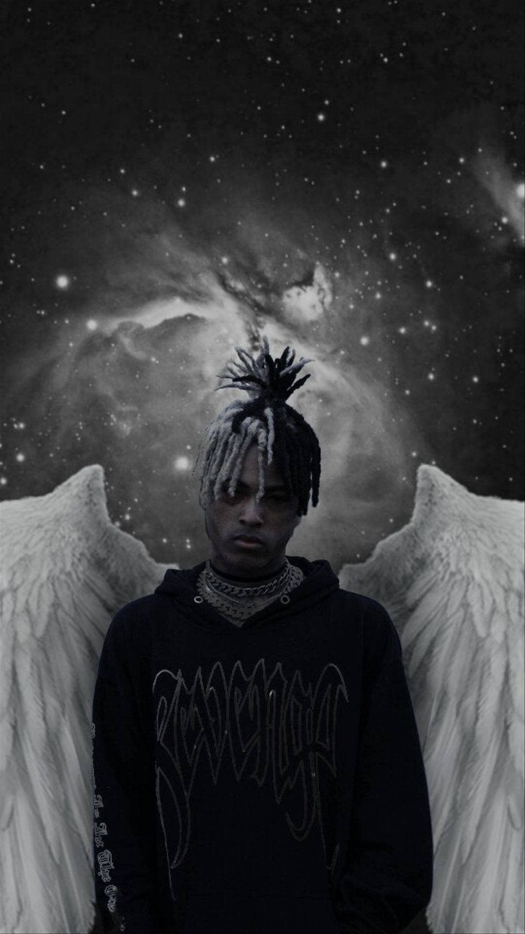 A man with wings and an angelic look - XXXTentacion