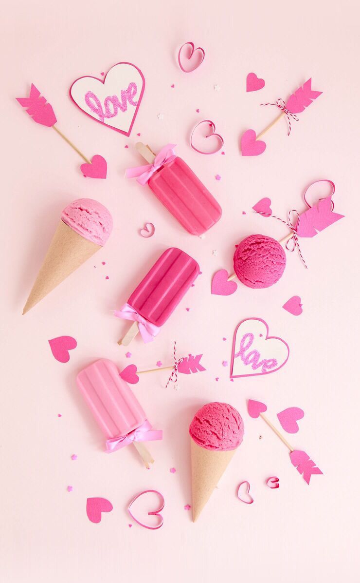 A group of pink ice cream cones with hearts - Ice cream