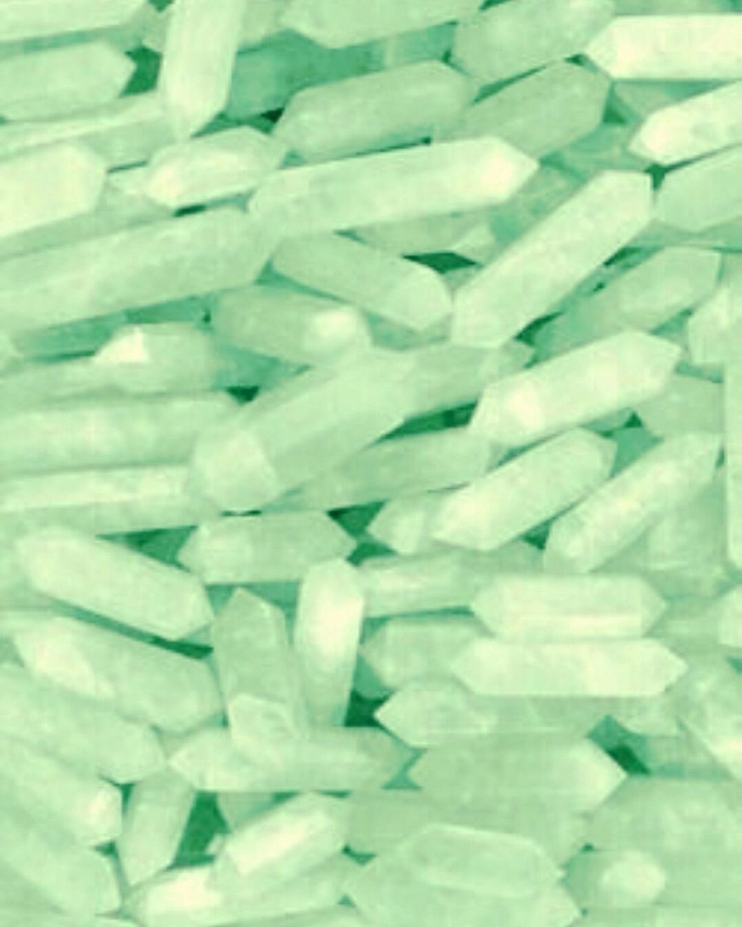 A pile of white and green candy sticks - Mint green, pastel green, soft green, light green