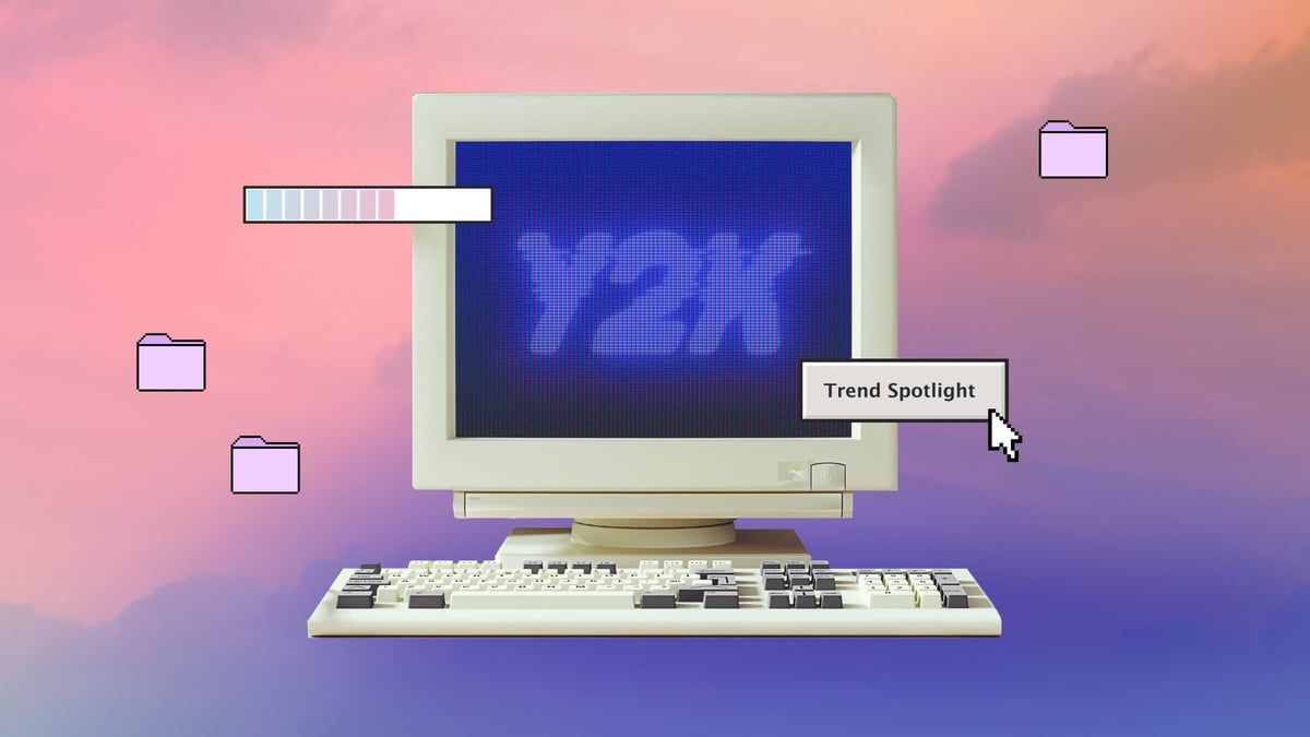 A computer with an image of the sky in front - Y2K