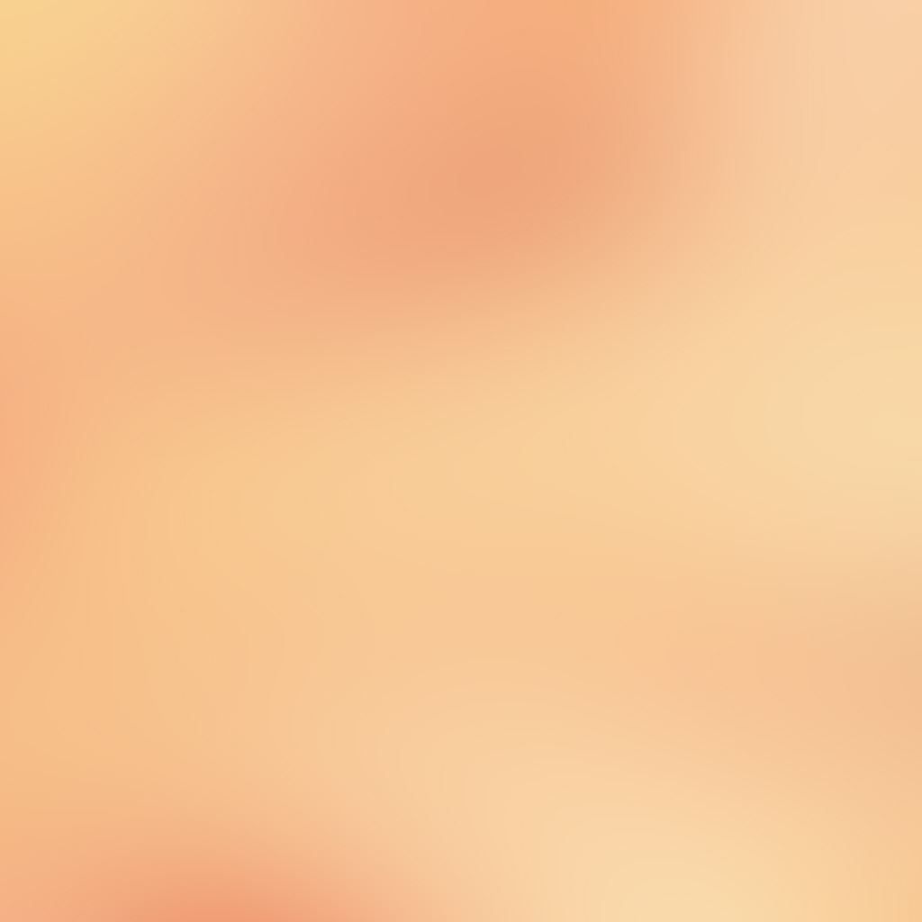 A blurred image of a sunset with a peach and orange gradient. - Peach