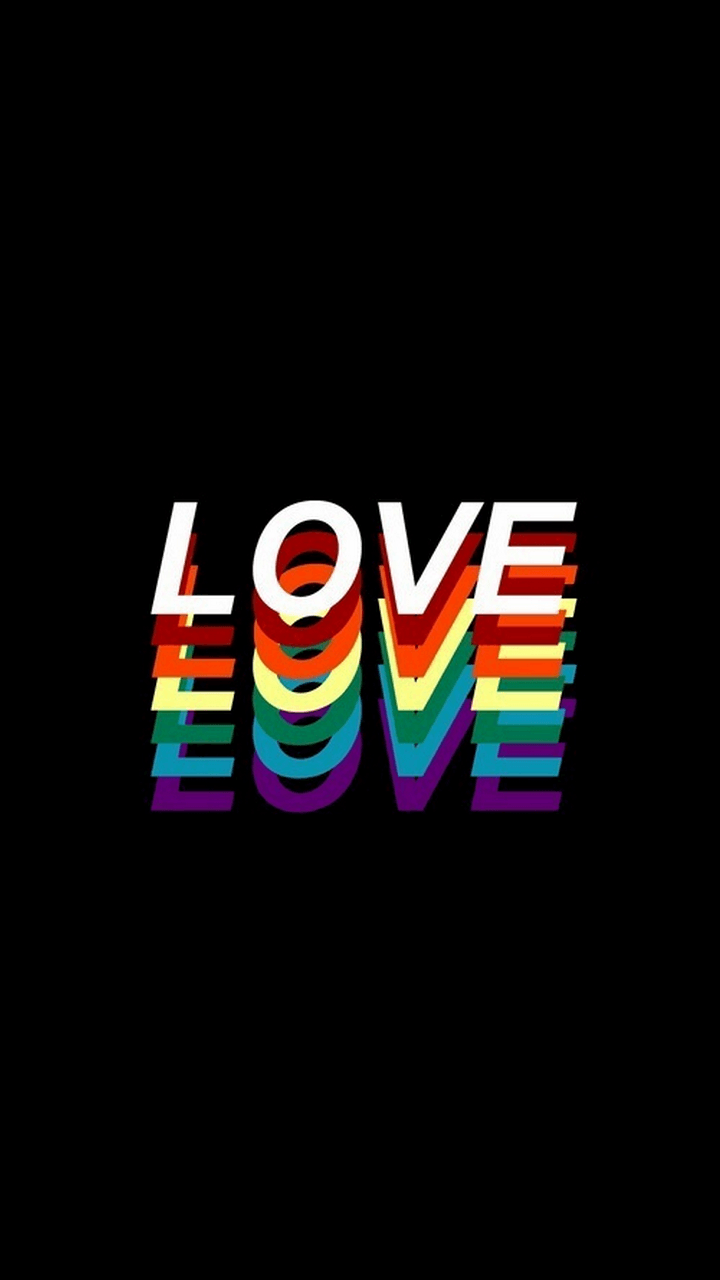 The word love is written in rainbow colors on a black background - Gay