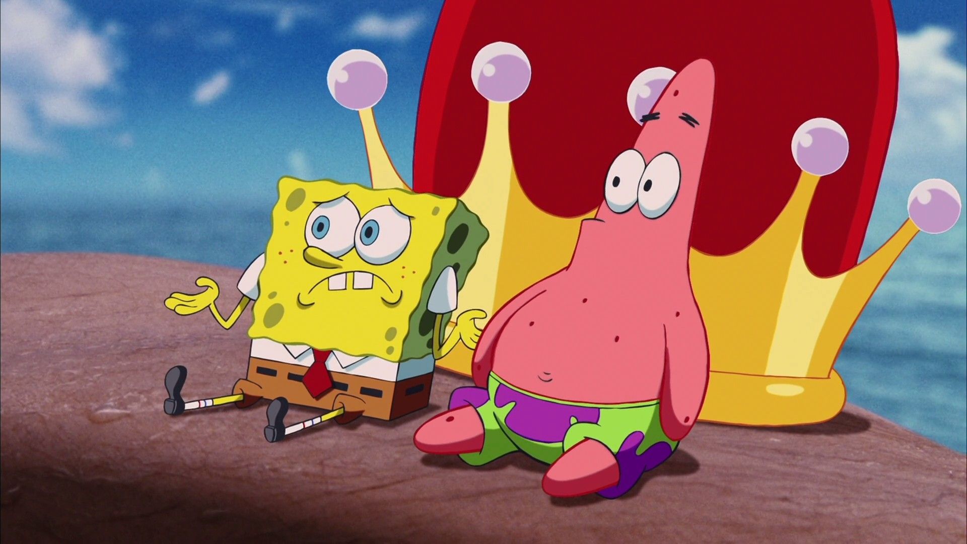 A cartoon sponge and squid sitting on the ground - SpongeBob