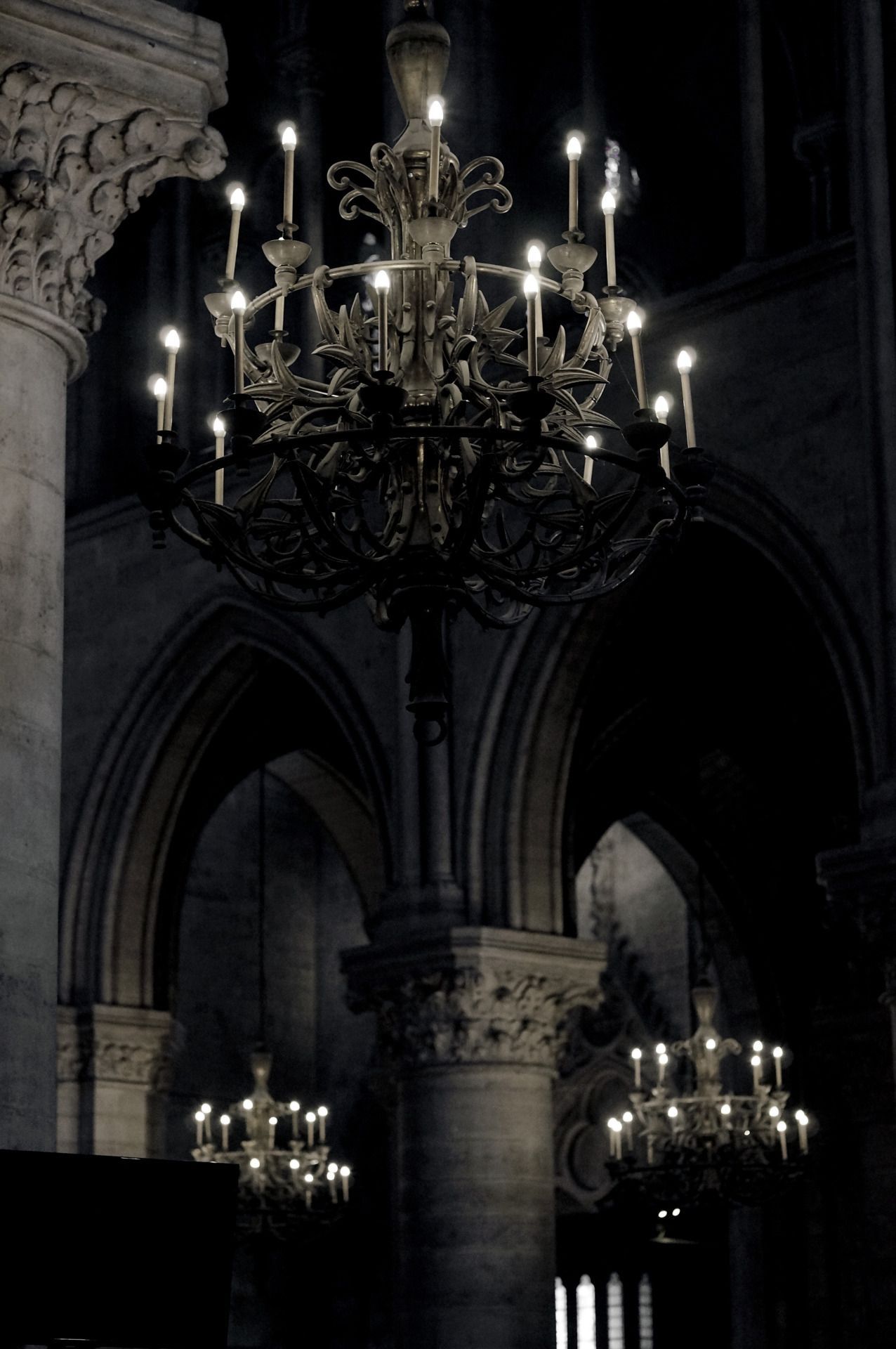 Two chandeliers hanging from the ceiling of a cathedral. - Gothic, architecture